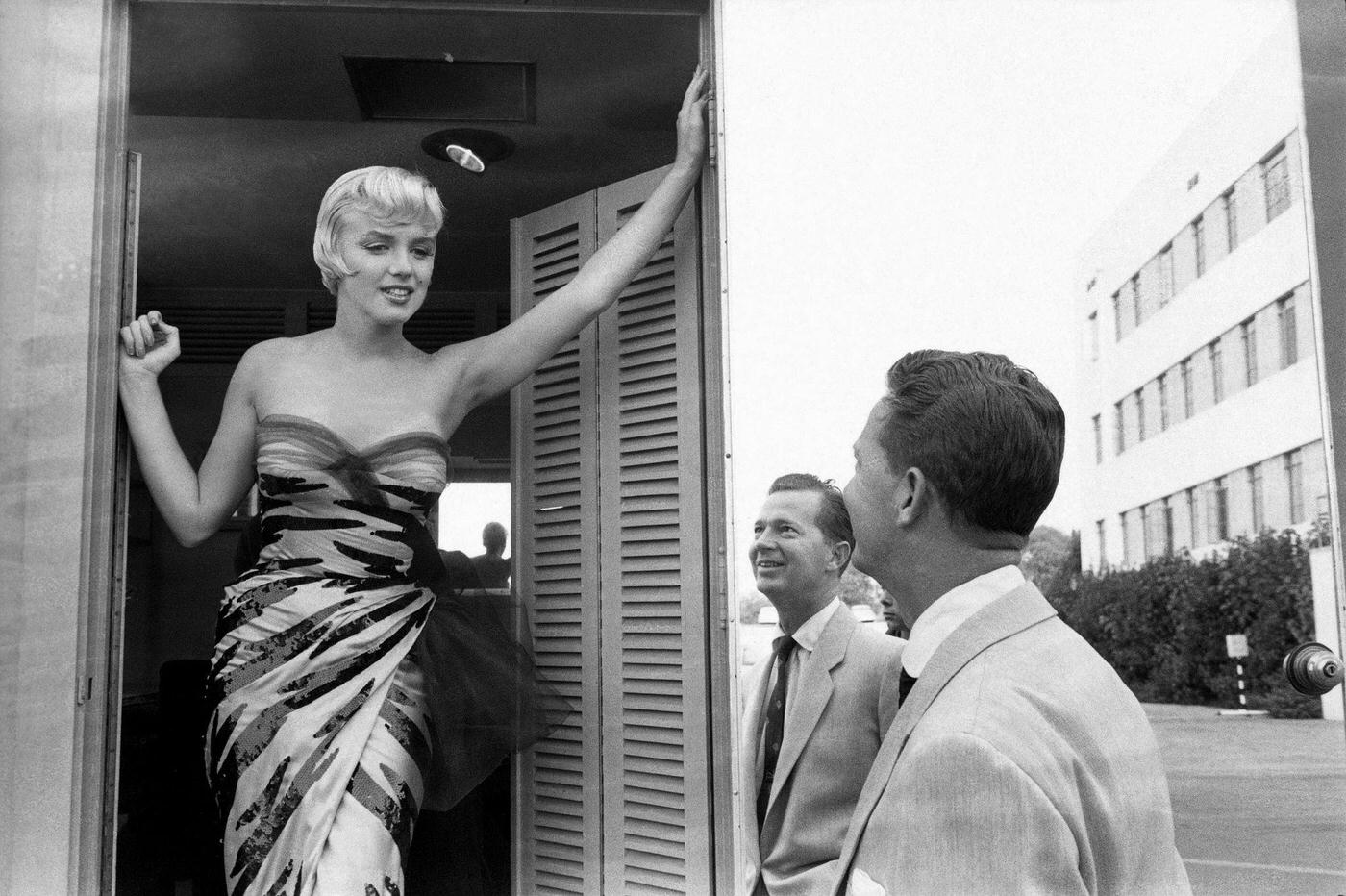 Marilyn Monroe Stands In A Doorway Wearing A Tiger-Striped Dress In 1954 During The Filming Of &Amp;Quot;The Seven Year Itch&Amp;Quot;