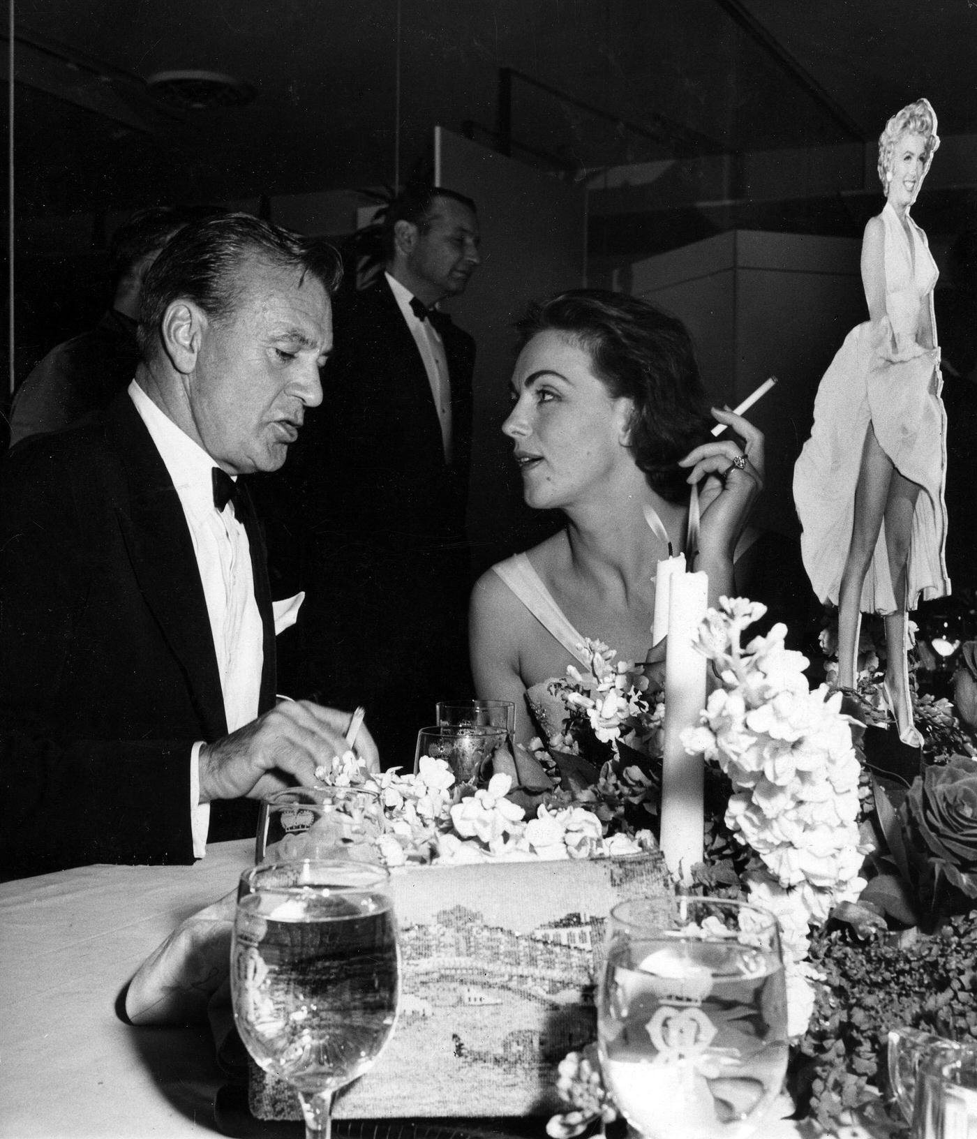 Gary Cooper With Hjordis Tersmeden, Wife Of Actor David Niven, At The Wrap Party For The Filming Of &Amp;Quot;The Seven Year Itch&Amp;Quot; At Romanoff'S Restaurant In 1954
