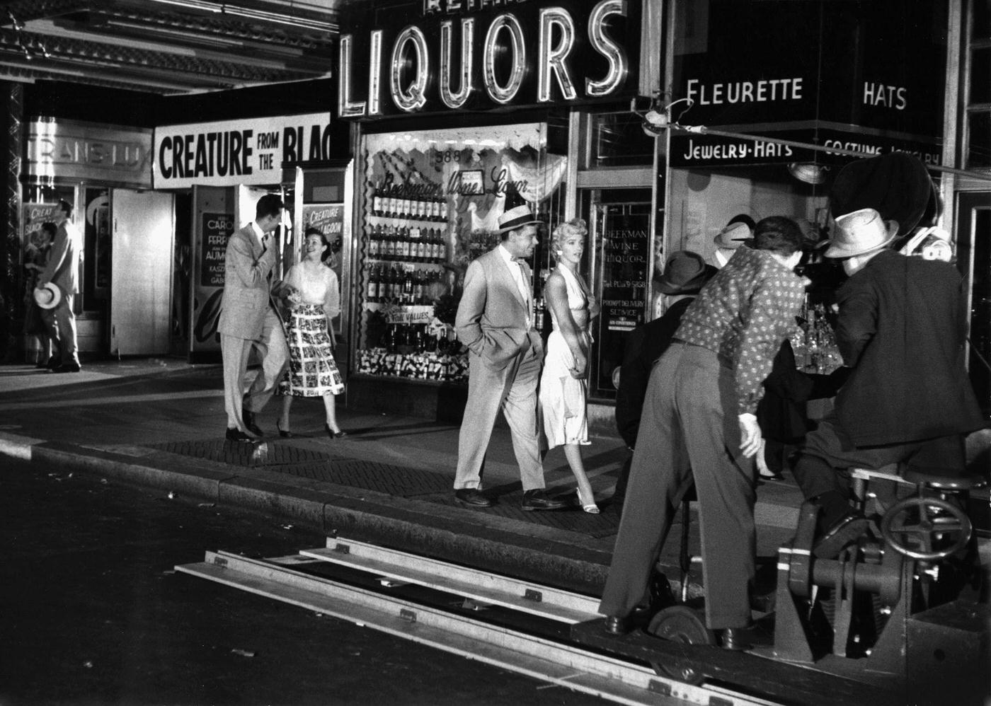 Marilyn Monroe Walking With Tom Ewell In Front Of The Trans-Lux Theater On The Corner Of 51St Street And Lexington Avenue While Filming The Famous Skirt-Blowing Scene For &Amp;Quot;The Seven Year Itch&Amp;Quot; In September, 1954