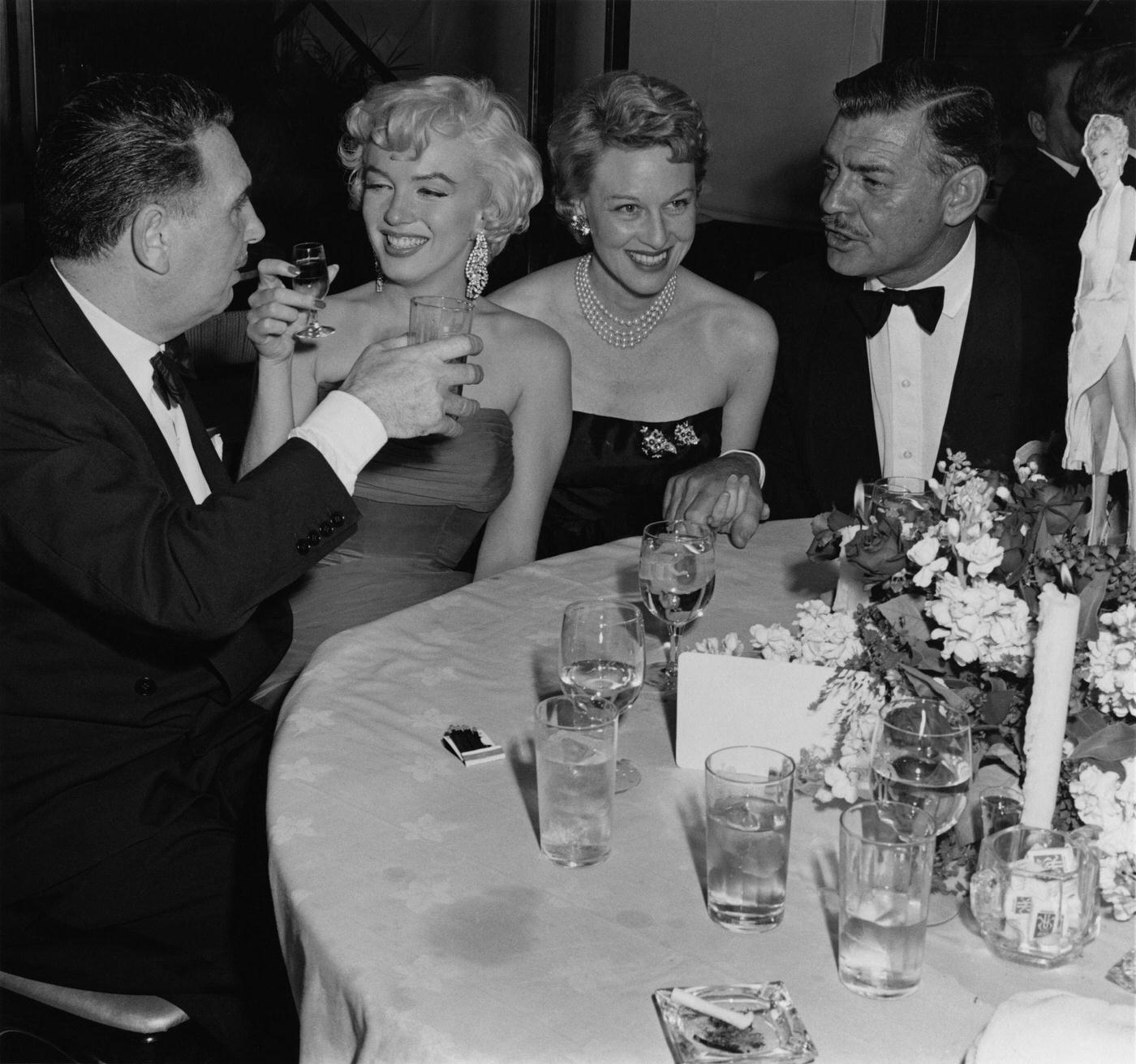 Marilyn Monroe With Actor Clark Gable, Producer Charles K Feldman And Actress Jean Howard At The Wrap Party For The Filming Of &Amp;Quot;The Seven Year Itch&Amp;Quot;