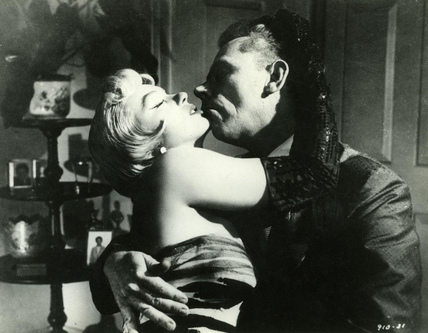 Marilyn Monroe And Actor Tom Ewell Clinch In This Movie Still From &Amp;Quot;The Seven Year Itch&Amp;Quot;, 1955.