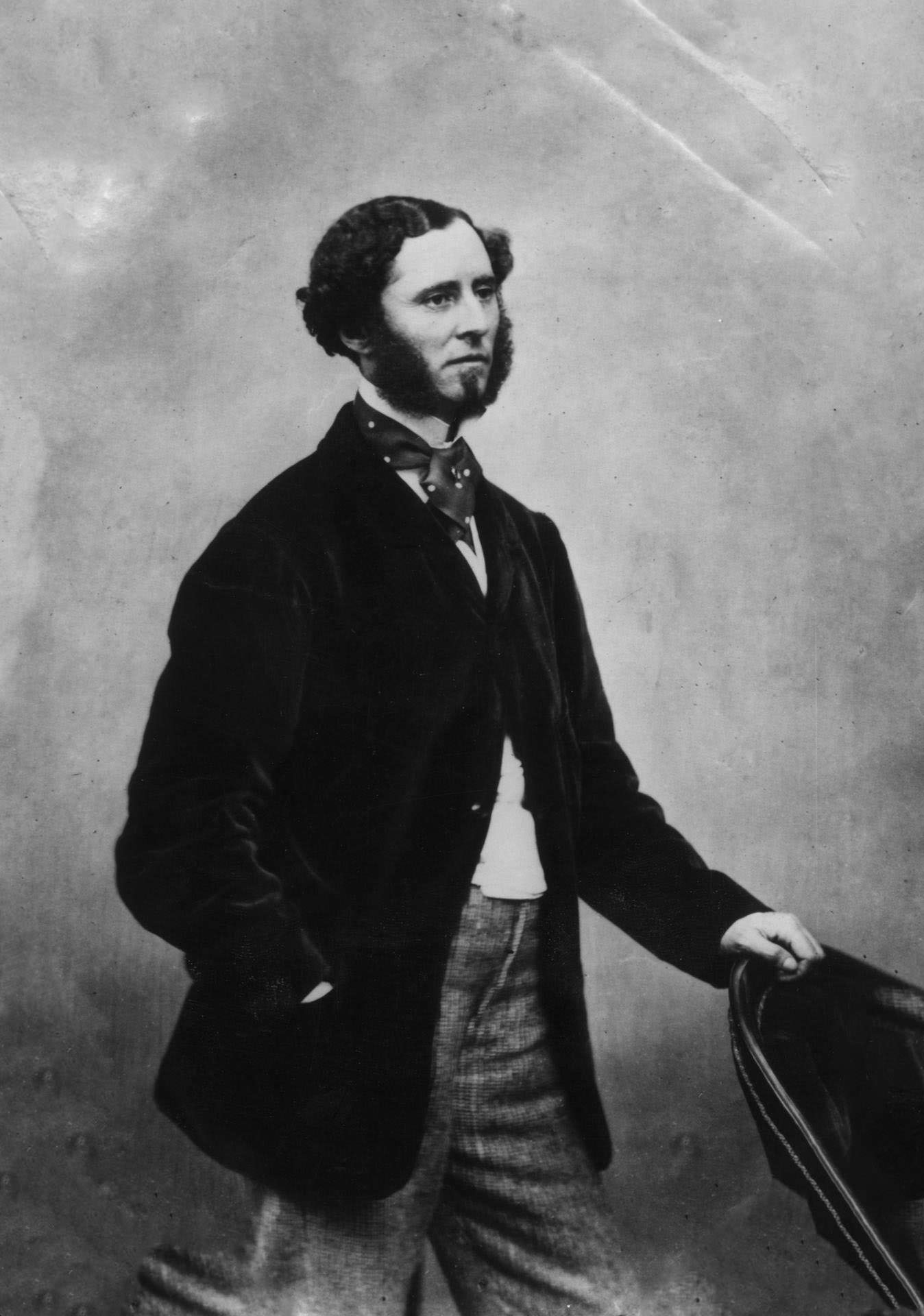 A Victorian Man With Beard And Sideburns Wearing A Velvet Jacket And Cravat, 1860S