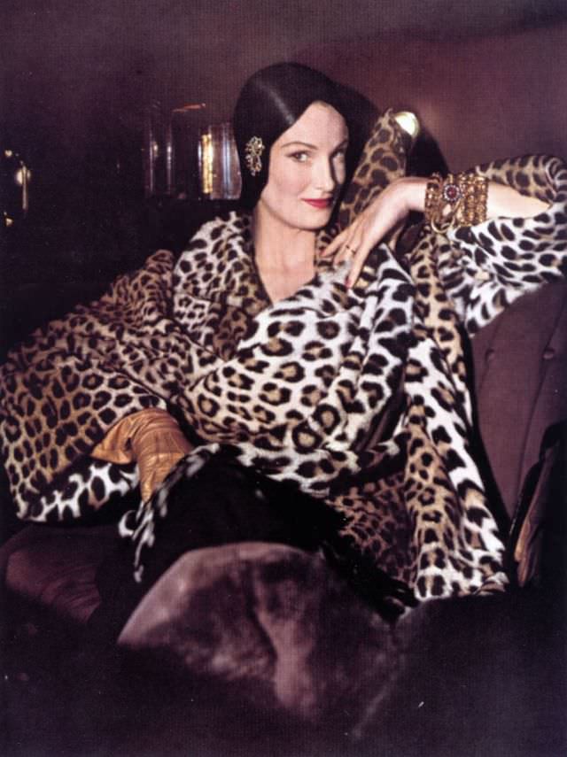 Wenda Parkinson In Leopard Coat From Aaron Reiss, Shellacked Beaver Cap By Mr. John, Jewelry By Cartier, American Vogue, 1949