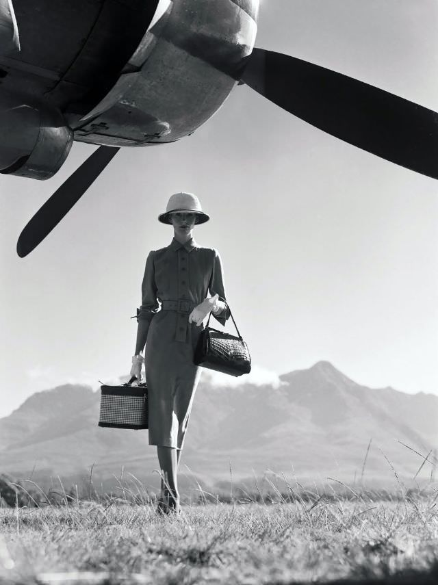 Wenda Parkinson Models A Suit Under A Plane On A Nairobi Landing Strip, 1951