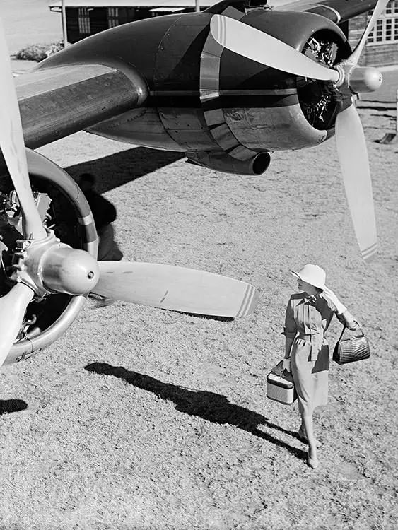 Wenda Parkinson Wearing A Grey Gabardine Dress In Nairobi, Kenya, South Africa, Next To A Hermes Aeroplane, 1951