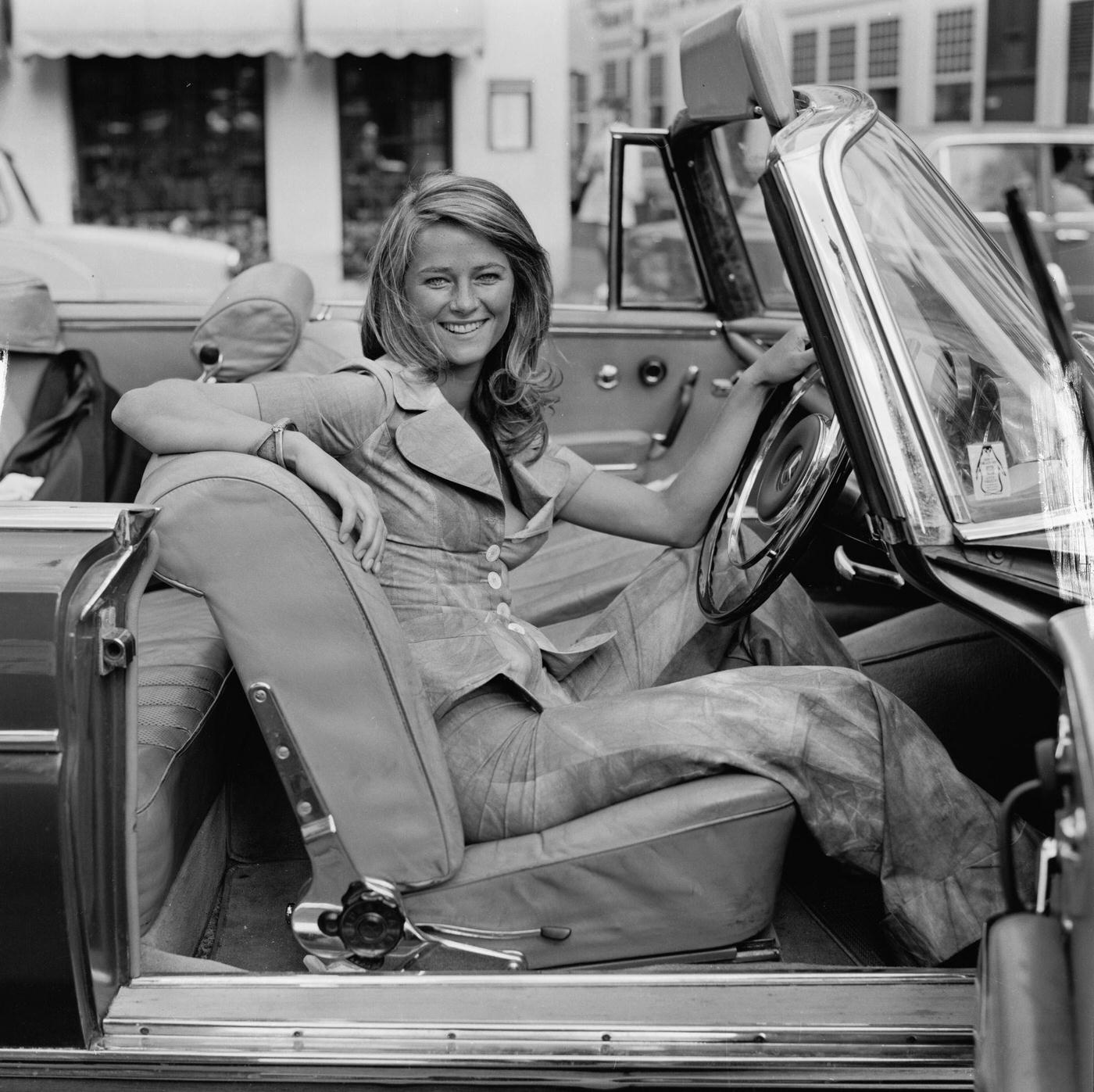 Charlotte Rampling In Bell Bottoms On A Convertible Car, 1971