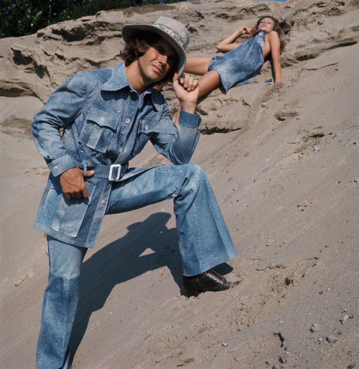 Robert Chernin In A Denim Safari Outfit With Bell-Bottom Pants, 1972