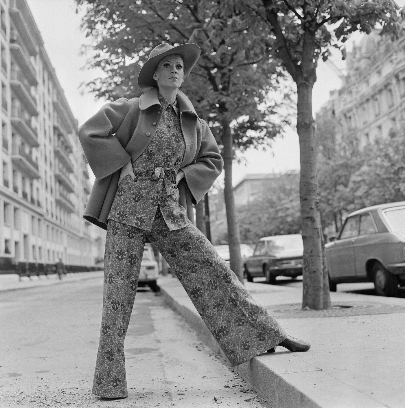 Model In A Rose-Printed Bell-Bottom Suit And Blue Reefer Jacket, 1972