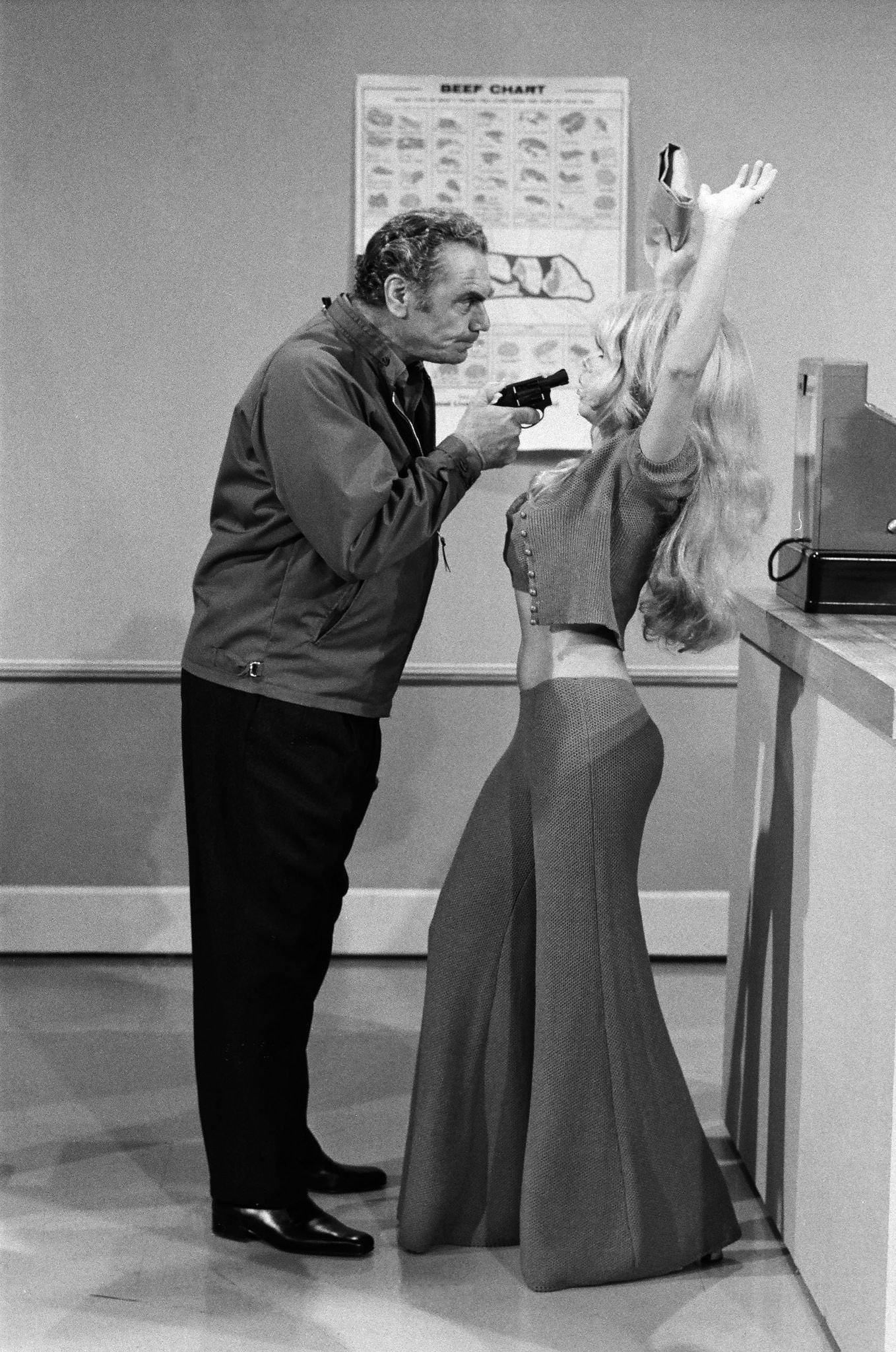 Ernest Borgnine And Charo In A Butcher Shop Robbery Skit On The Dean Martin Comedy Hour, Wearing Bell-Bottoms