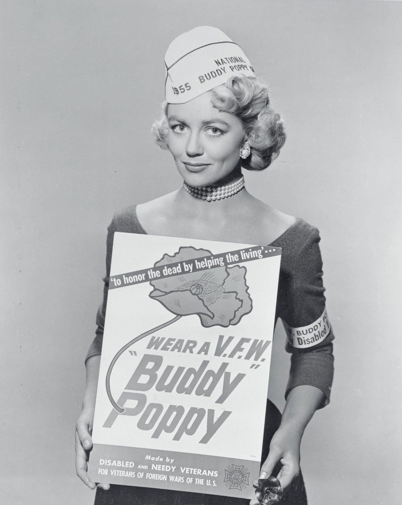 Actress Dorothy Malone Holds A Veteran Of Foreign Wars' &Amp;Quot;Buddy Poppy&Amp;Quot; Poster After Being Selected As The National Buddy Poppy Girl. The Buddy Poppy Sale Will Be Held Throughout The Country During The Week Of Memorial Day.