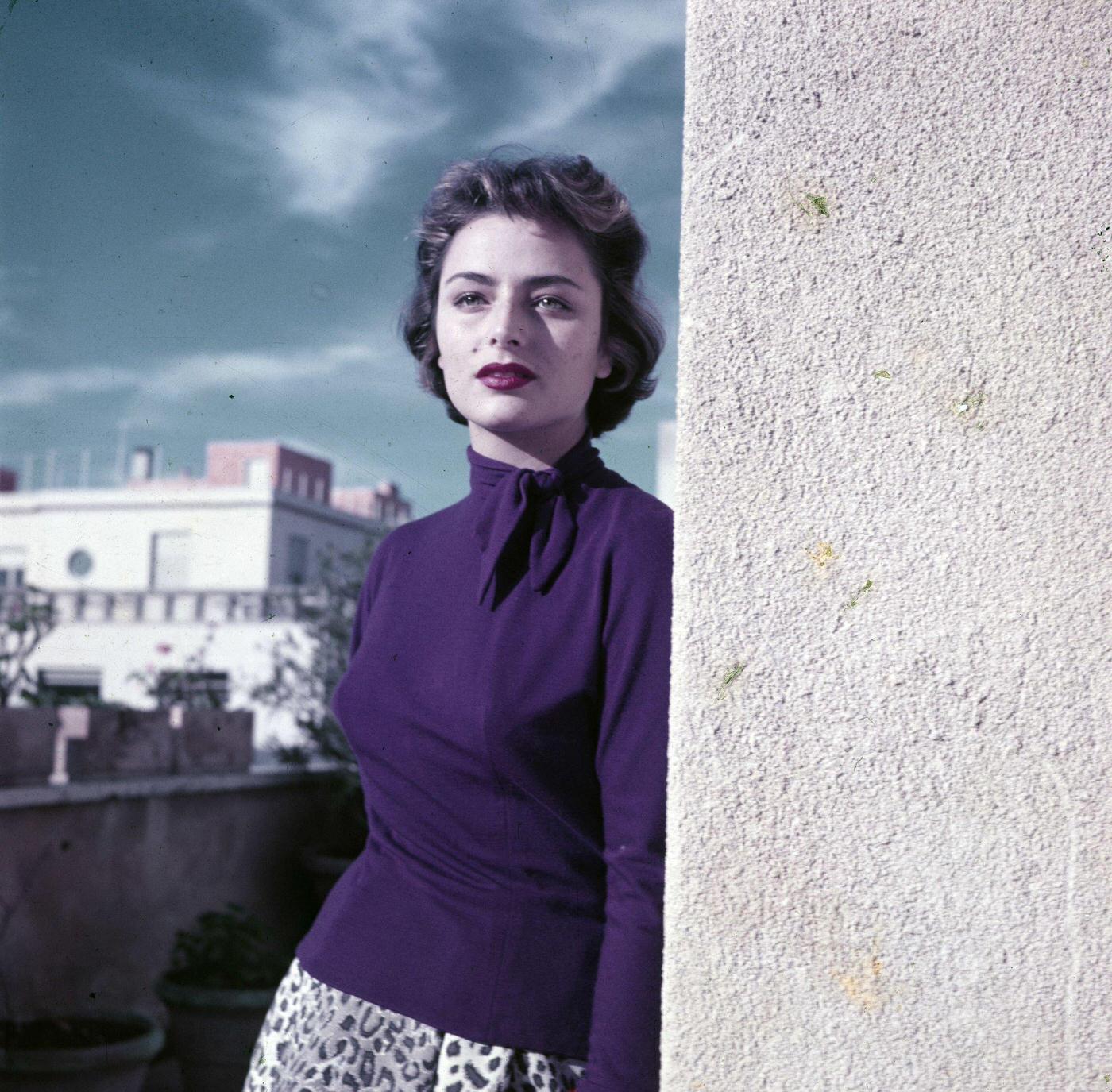Rendezvous With Marina Berti In December 1952, On A Terrace, During A Portrait Session, Wearing A Leopard-Print Skirt And A Purple Sweater.