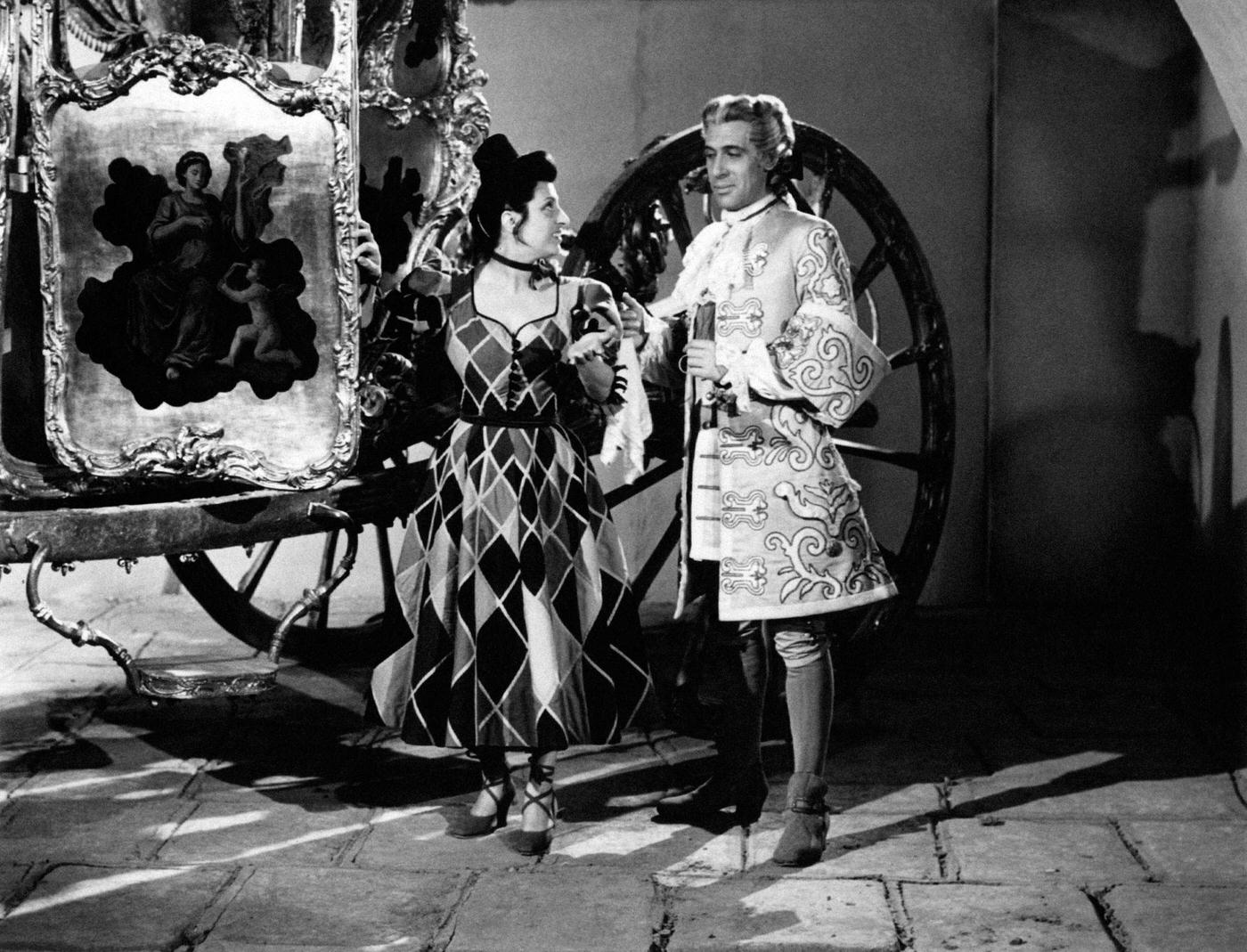 Duncan Lamont Asking Anna Magnani To Get In A Coach In The Film The Golden Coach, 1952