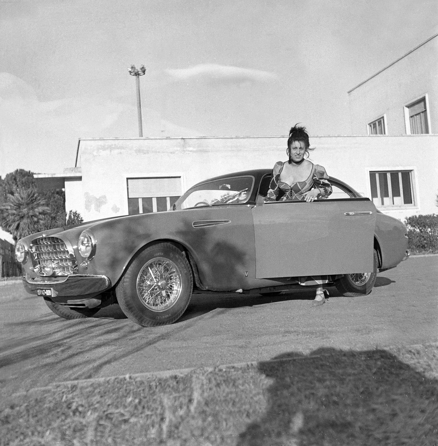 Anna Magnani Getting On A Ferrari In Italy, 1952
