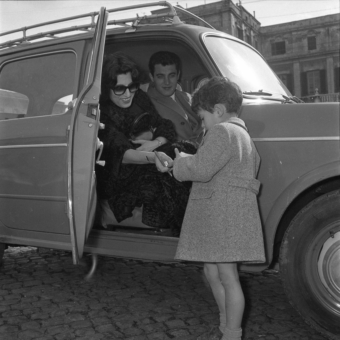 Anna Magnani With Her Son Luca Magnani, Going To The Casina Delle Rose For The Italian Film Award Nastro D'Argento, Rome 1953.