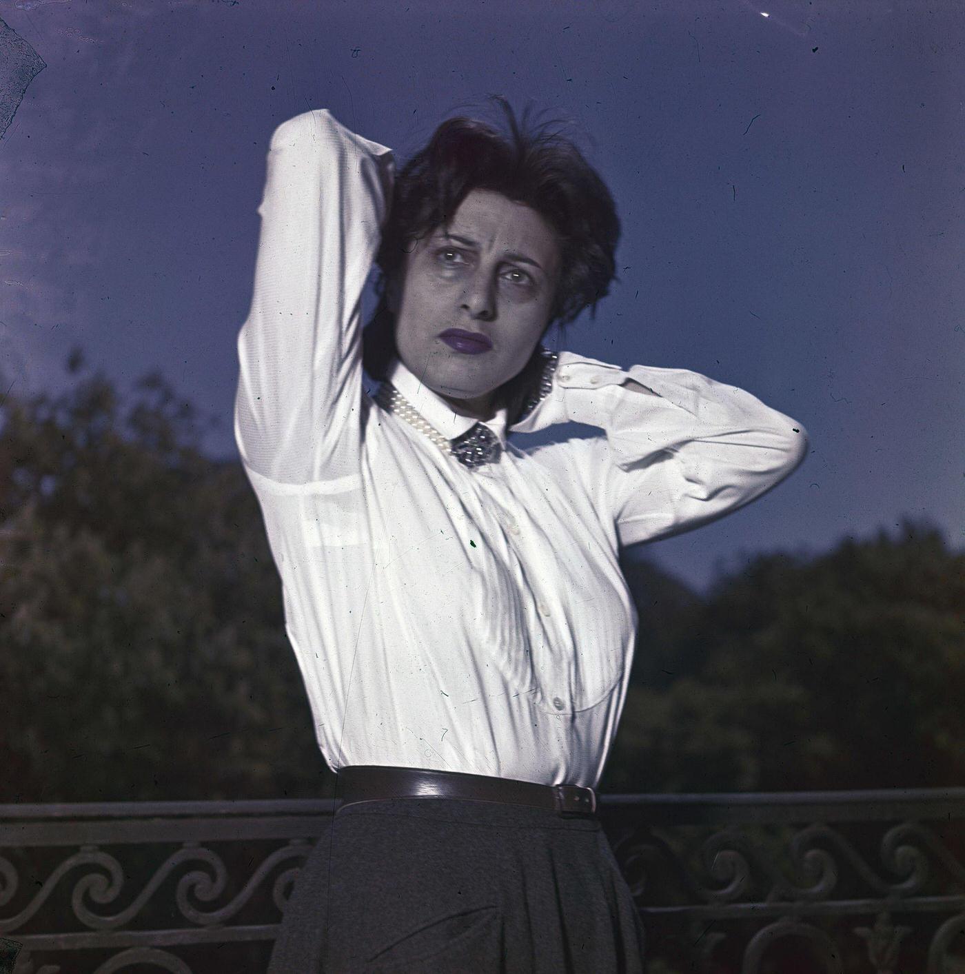 Anna Magnani Striking A Pose For Rendezvous With Anna Magnani, Wearing A White Blouse With Raised Arms, 1950S