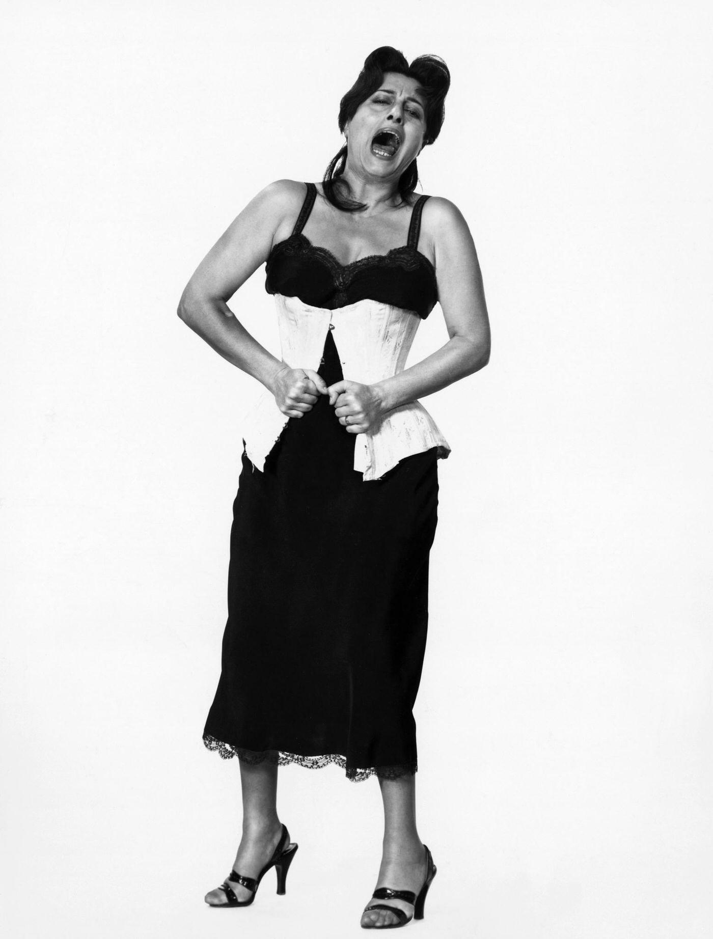 Anna Magnani Puts On A Girdle For The Film The Rose Tattoo, New York, 1955.