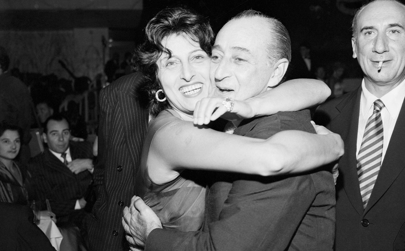 Anna Magnani And Stage Comic Prince Antonio De Curtis, Better Known As Toto, Share A Joyful Bear Hug After Receiving Special &Amp;Quot;Golden Mask&Amp;Quot; Awards For Their Acting During The Past 10 Years, Rome, 1955.