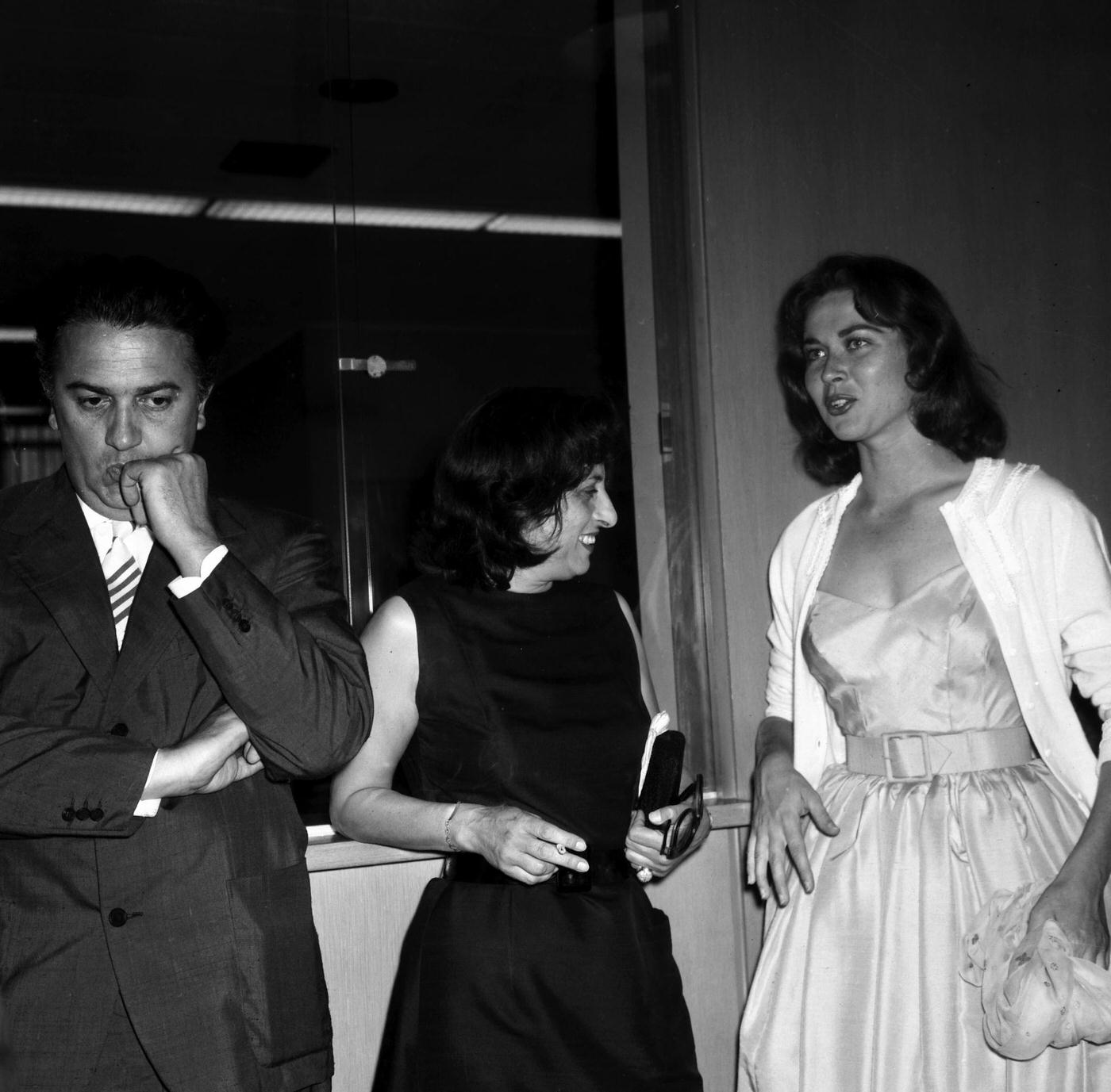 Director Federico Fellini And Anna Magnani Are Pictured At His Cocktail Party In Los Angeles, California, 1957