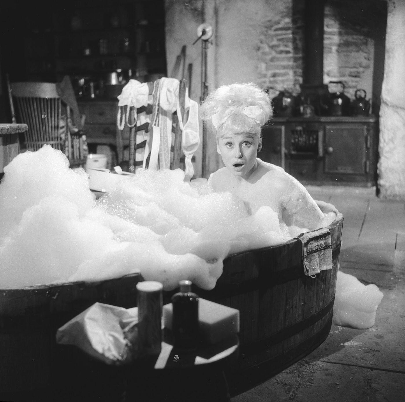 Barbara Windsor In A Bubble Bath During The Filming Of 'Crooks In The Cloisters', 1963.