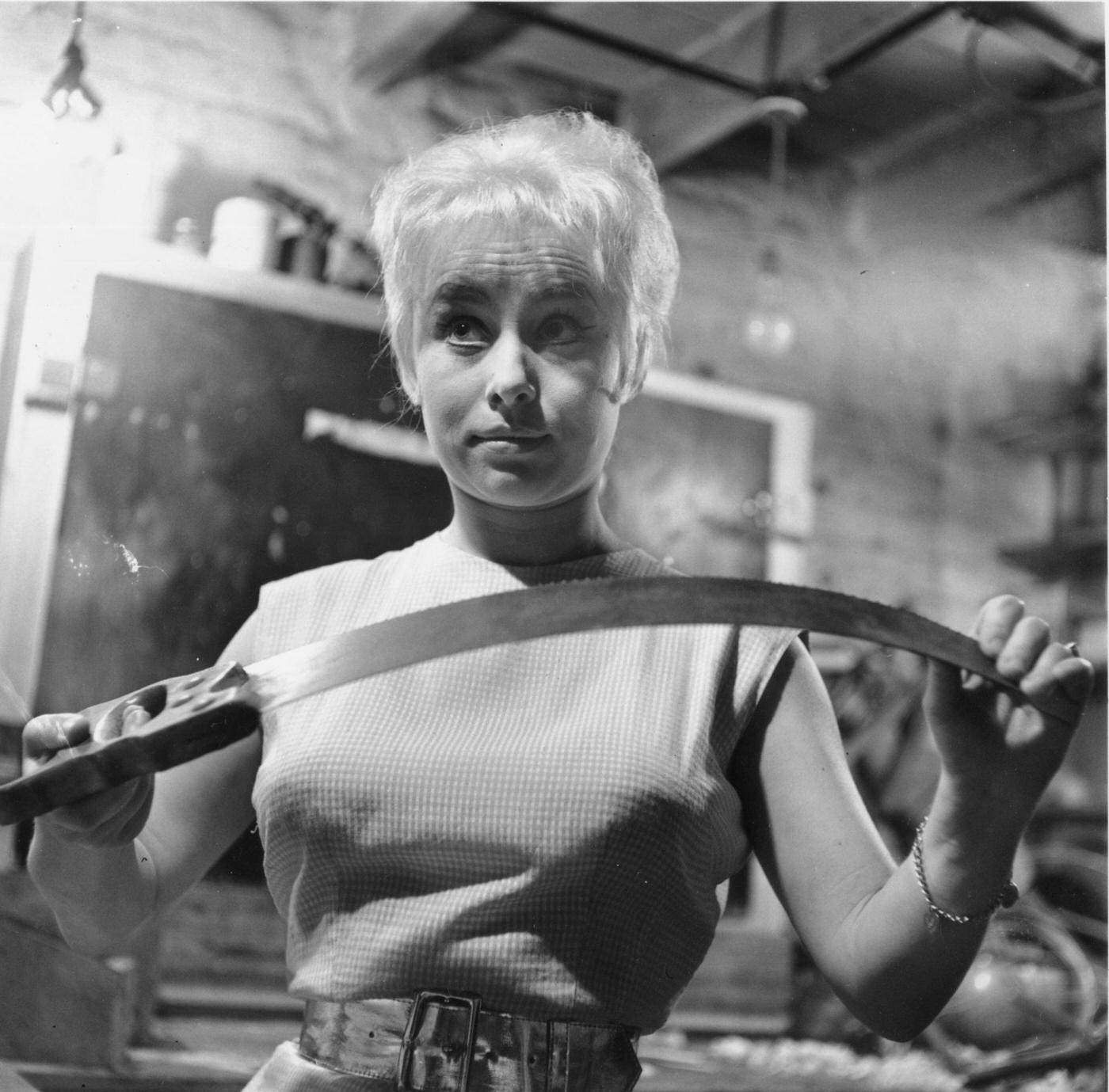 Barbara Windsor Bending A Saw, 1960.