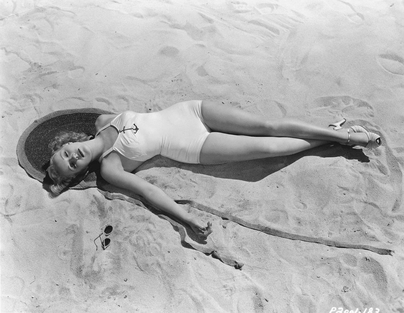 Betty Grable Relaxing On A Beach Around The Time Of Her Appearance In The 1937 Movie Thrill Of A Lifetime