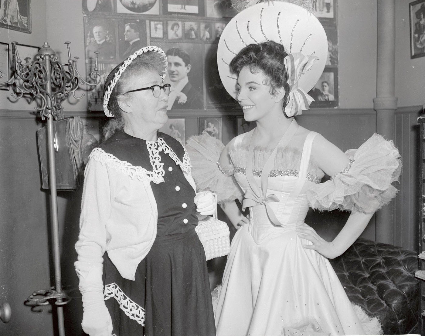 Evelyn Nesbit, Looks At Herself As She Was 50 Years Ago. Joan Collins Portrays Miss Nesbit In The Screen Story Of Her Life, The Girl In The Red Velvet Swing, 1955.
