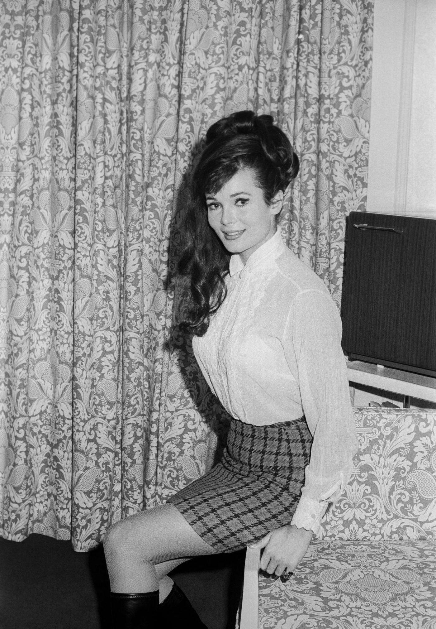 Gila Golan Posing In A Plaid Mini-Skirt In A New York Hotel Room 1970.