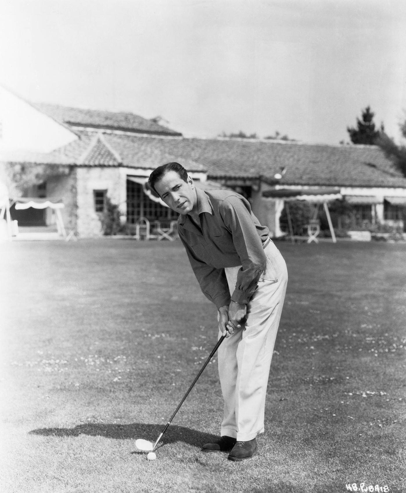 Humphrey Bogart In An Undated Publicity Still Playing Golf