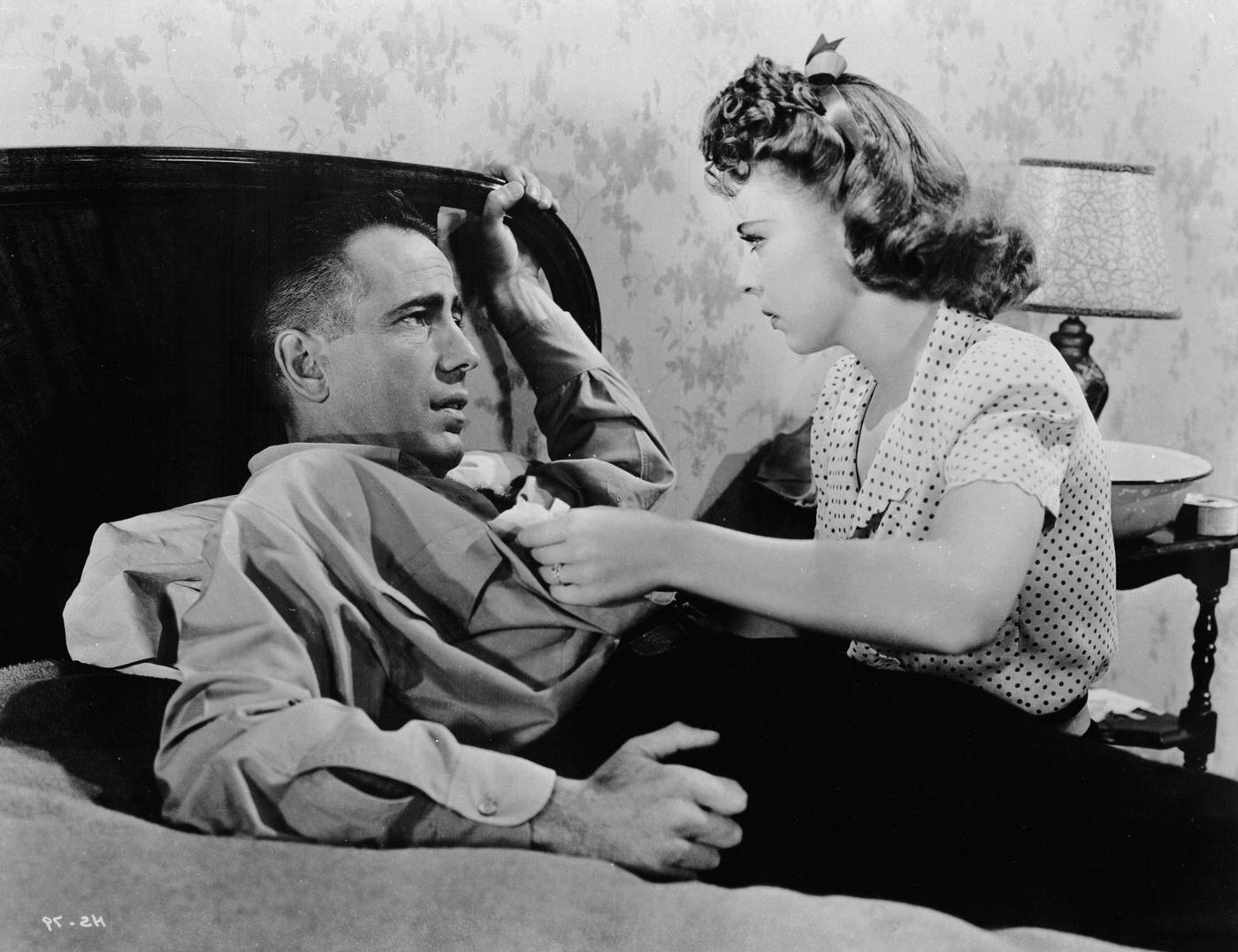 Ida Lupino Tends To The Wounded Humphrey Bogart In Raoul Walsh'S 'High Sierra', 1940