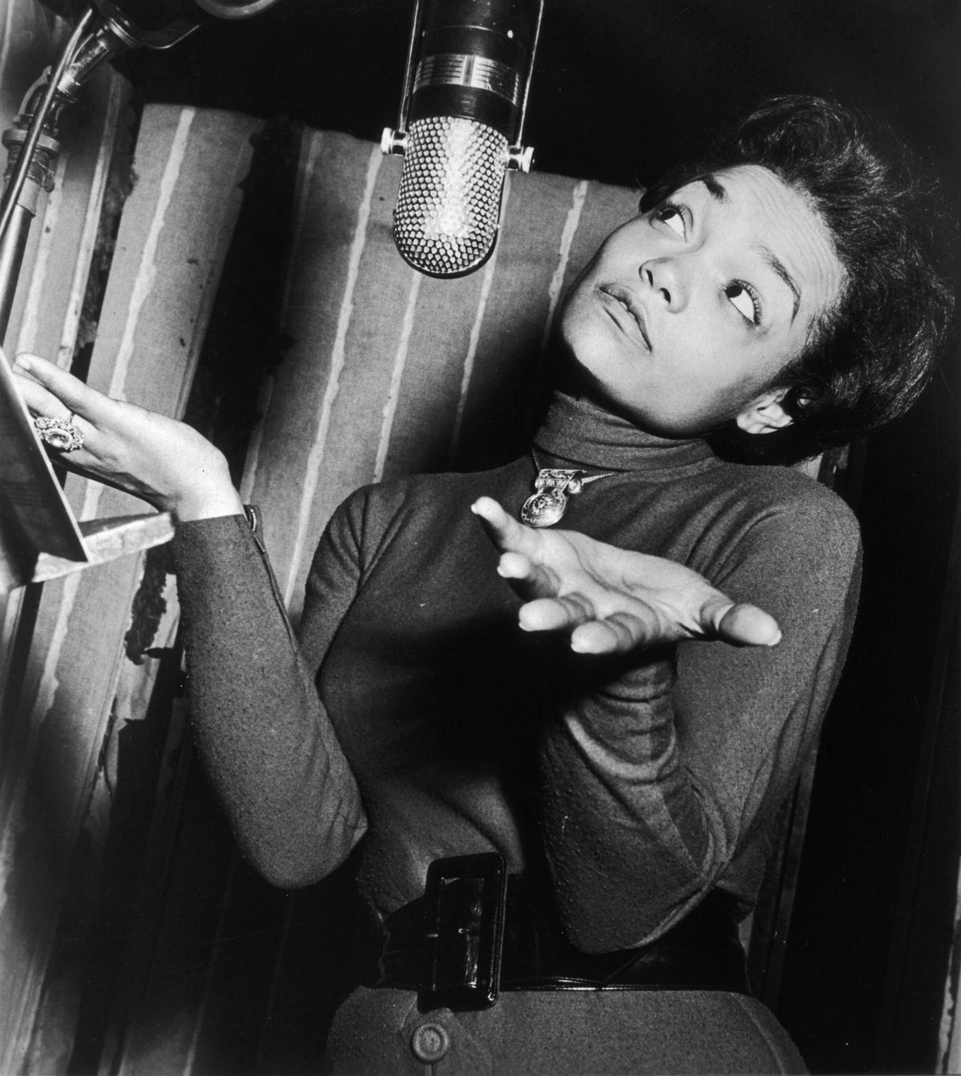 Eartha Kitt Shrugging Her Shoulders In A Recording Studio, 1955