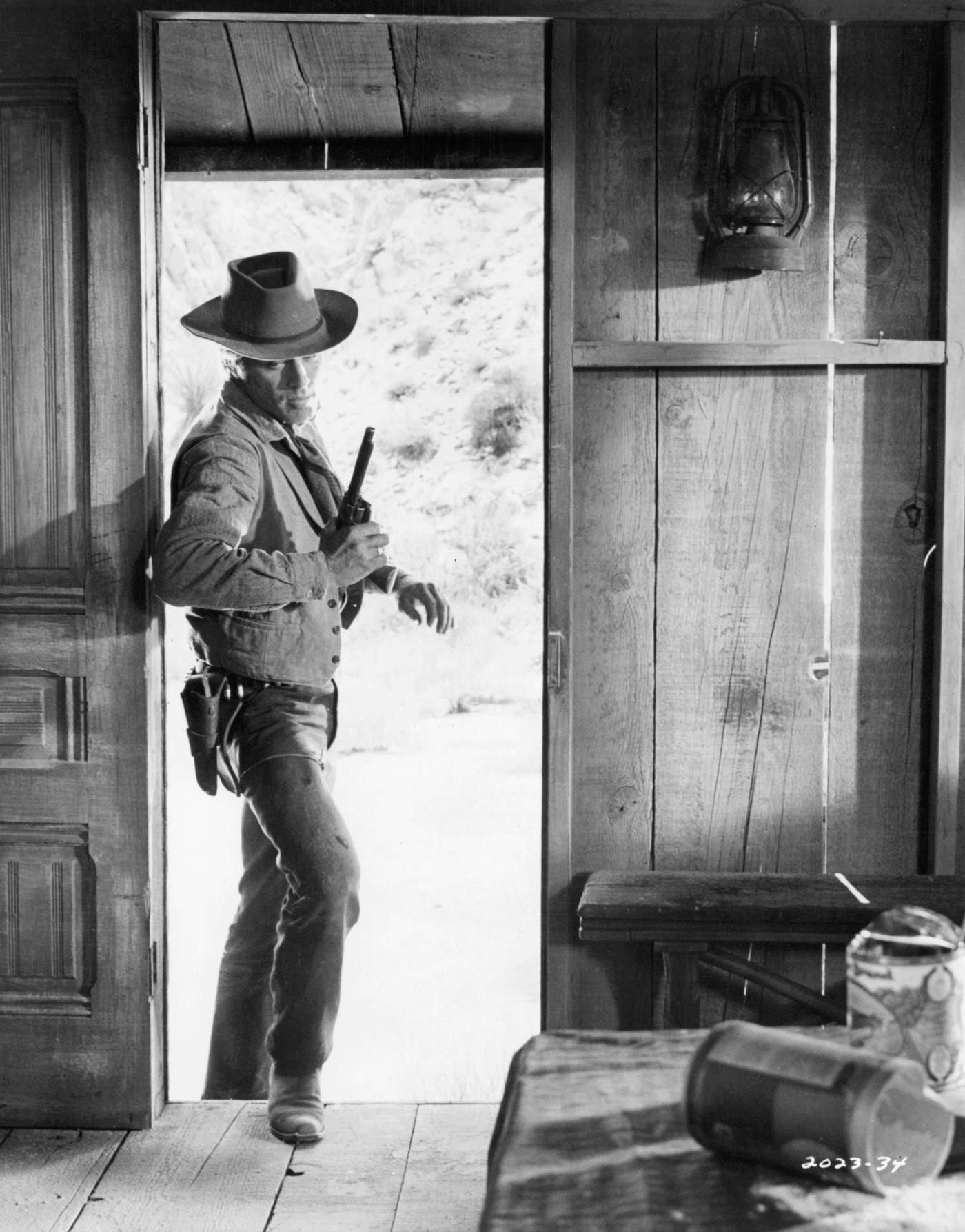 Robert Redford Entering An Empty Cabin In A Scene From 'Tell Them Willie Boy Is Here', 1969.