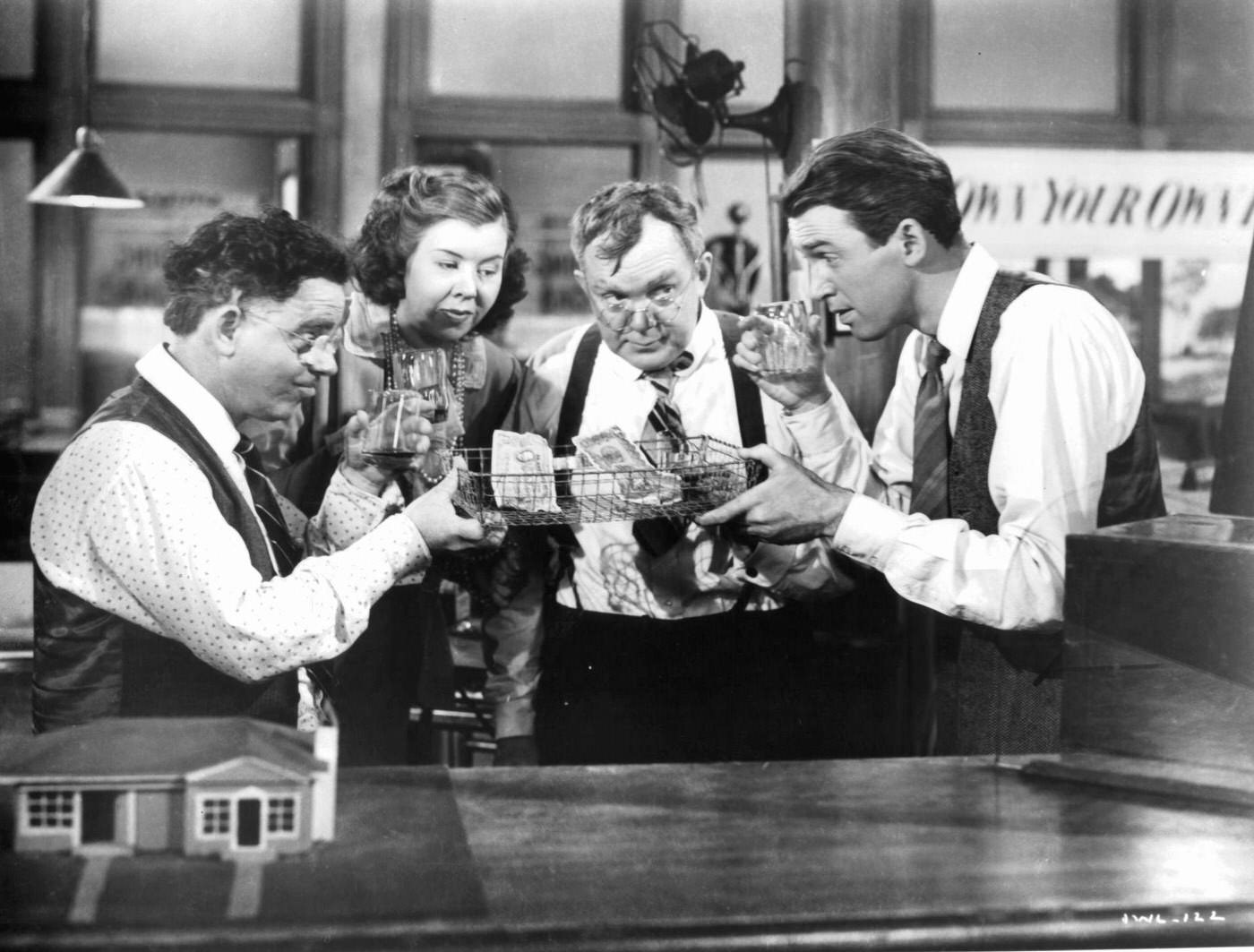 James Stewart Toasting Drinks With Others In 'It'S A Wonderful Life', 1946.