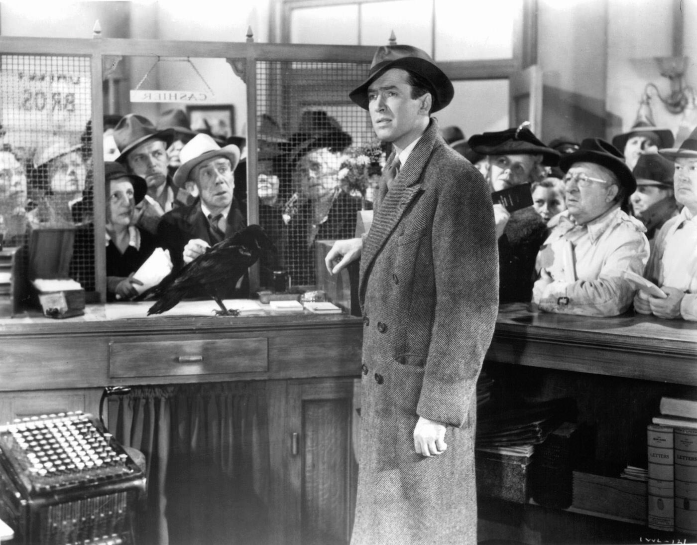 James Stewart Standing In A Bank Cashier Cubicle In 'It'S A Wonderful Life', 1946.