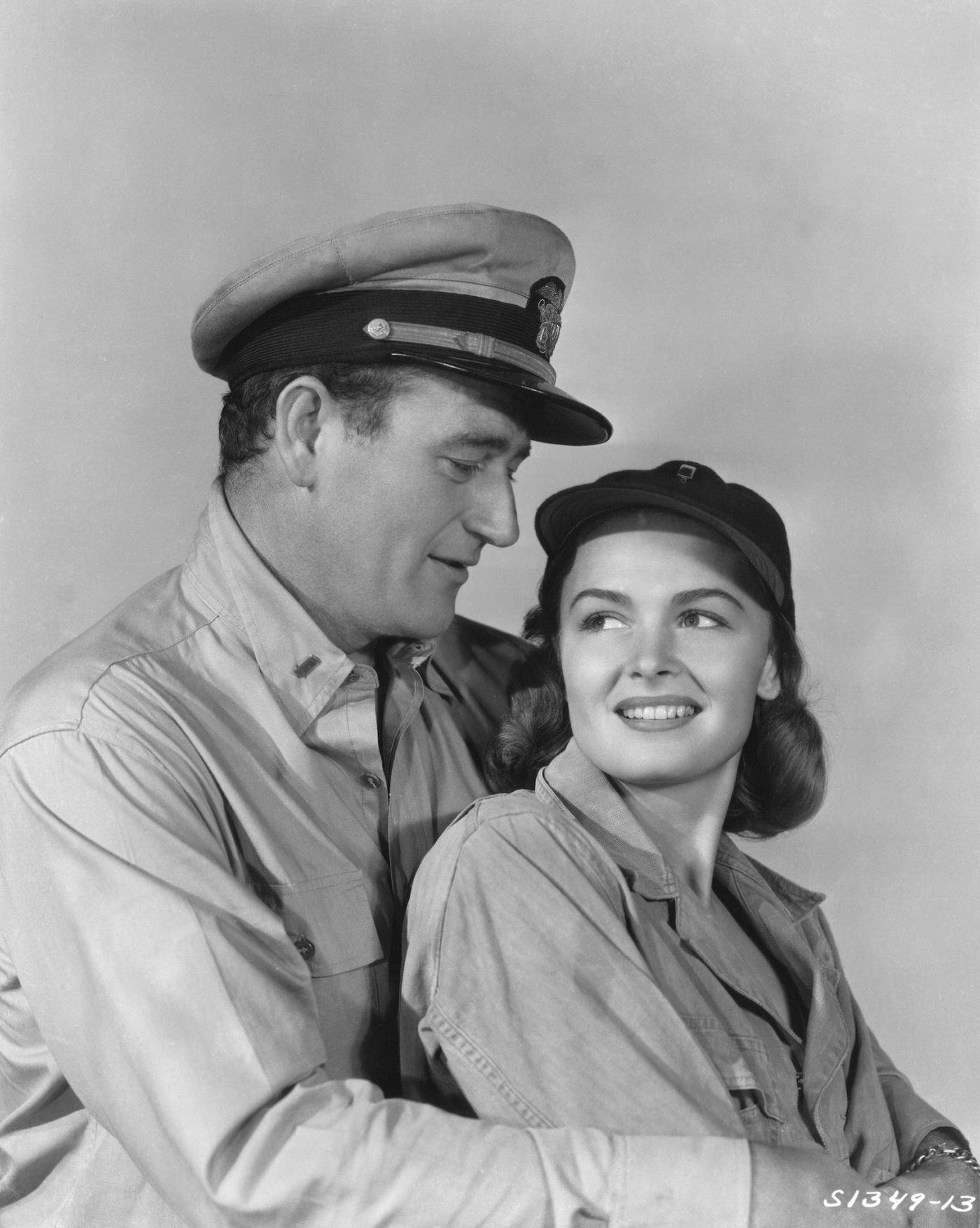 John Wayne And Donna Reed On The Set Of &Amp;Quot;They Were Expendable&Amp;Quot; Directed By John Ford Circa 1945 In Los Angeles, California.