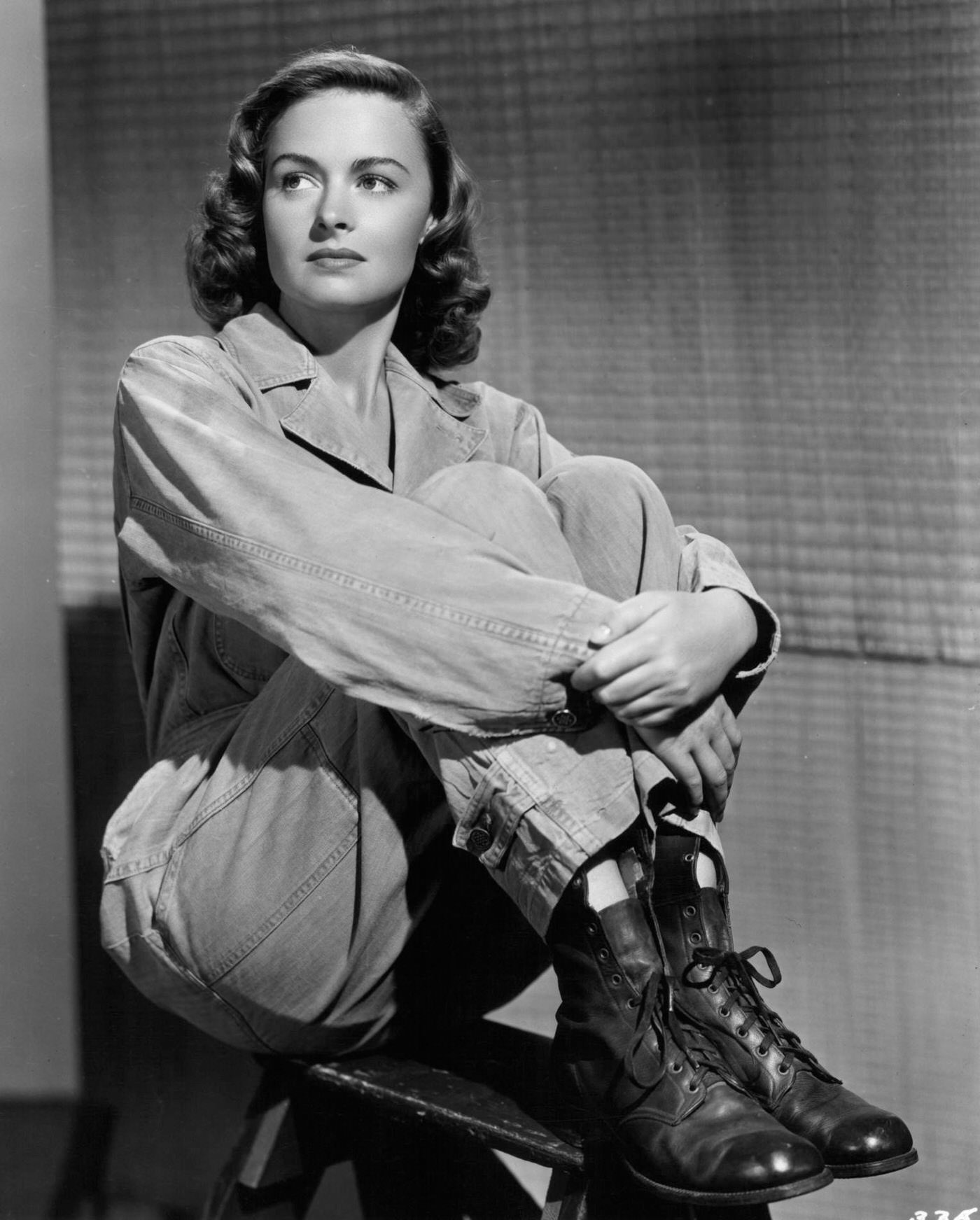 Donna Reed Sitting On A Bench In A Scene From The 1945 Film &Amp;Quot;They Were Expendable.&Amp;Quot;