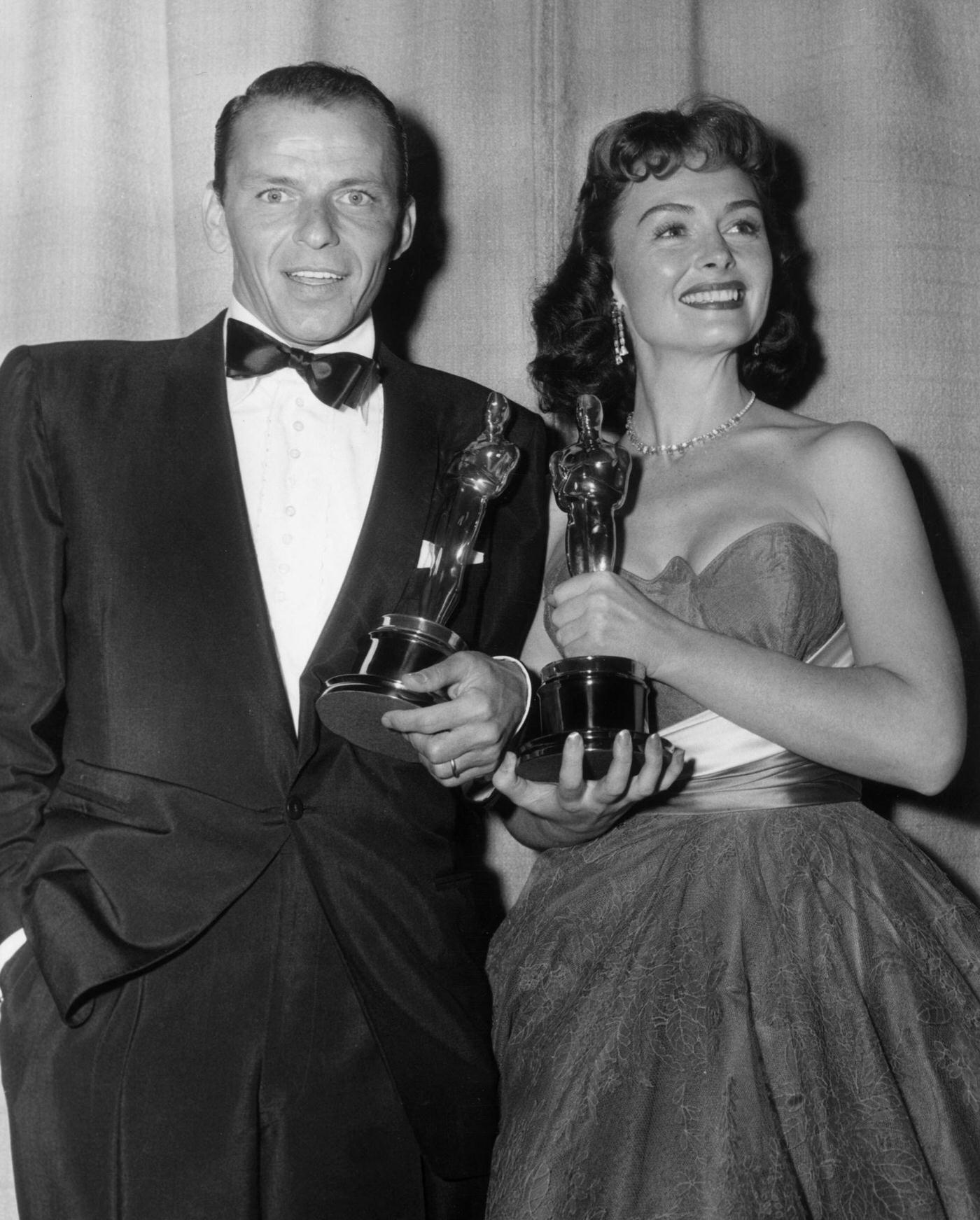 Donna Reed And Frank Sinatra Hold Their Oscars For 'From Here To Eternity' At The Academy Awards, 1954.
