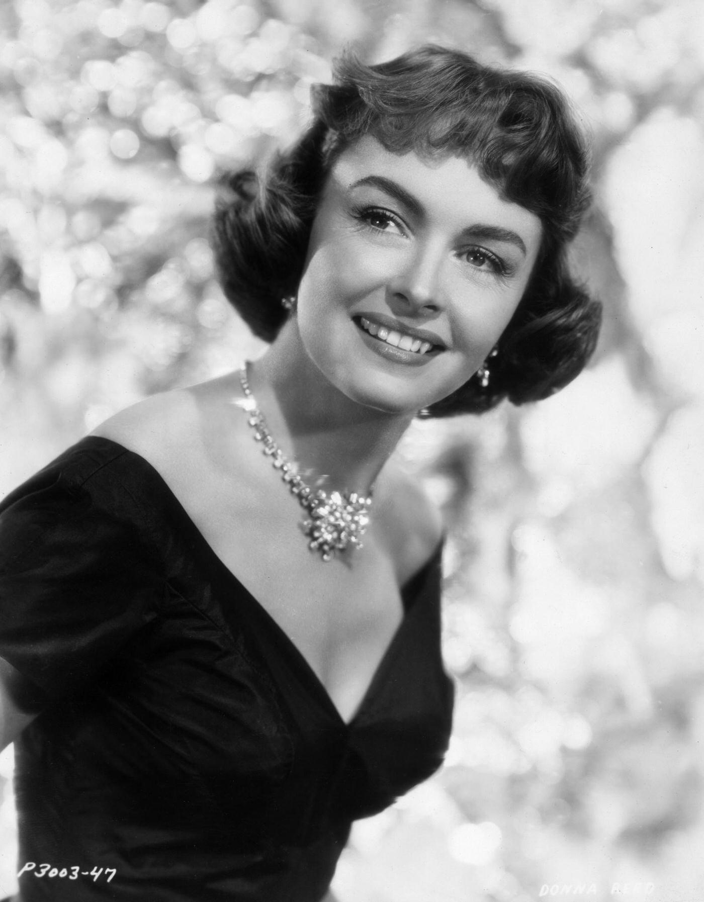 American Actor Donna Reed Smiles In A Promotional Portrait, Circa 1955.
