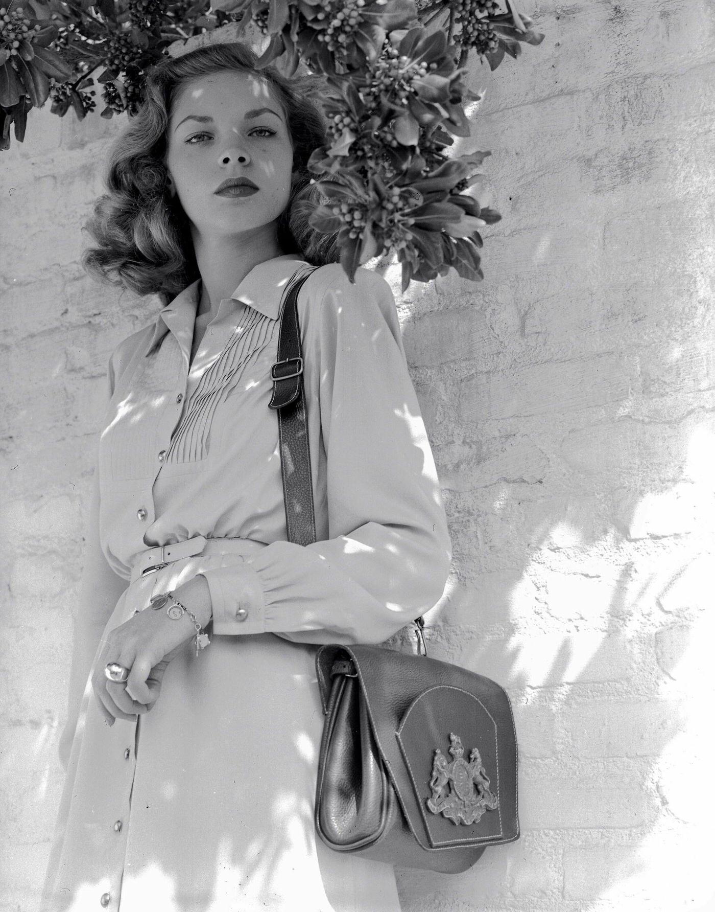 Actress Lauren Bacall, For Warner Bros. Studios, Posing For Photographs Outdoors, 1945