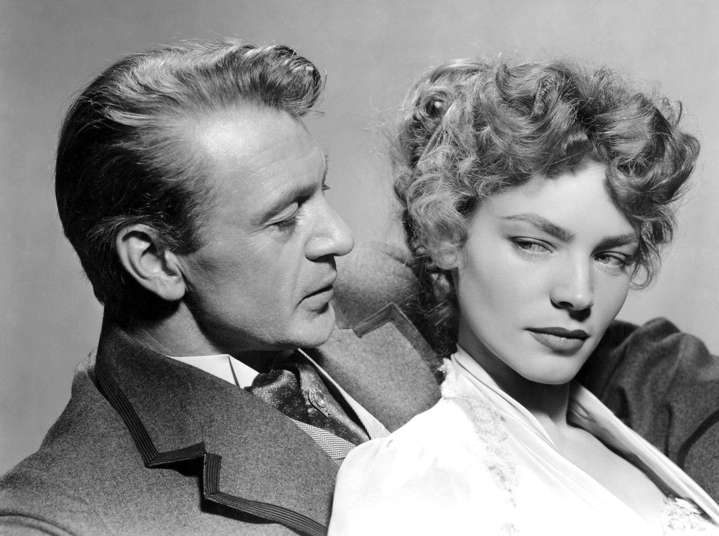 Gary Cooper And Lauren Bacall On Set Of 'Bright Leaf,' Directed By Michael Curtiz In 1950.