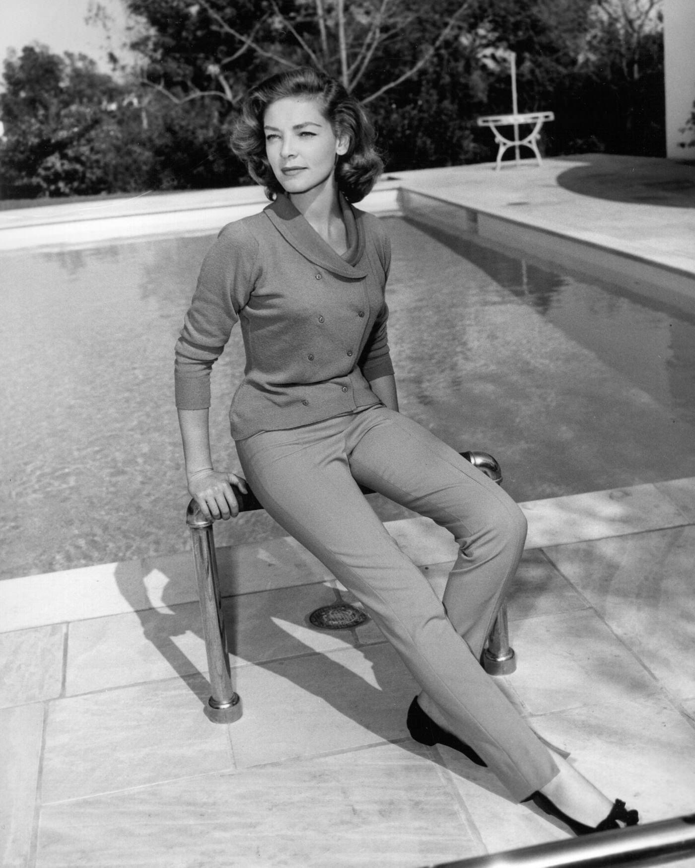 Lauren Bacall Poses In An Italian Sweater In The Backyard Of Her Bel Air Home After Completing Work On The Film &Amp;Quot;The Cobwebs&Amp;Quot; In April 1955.