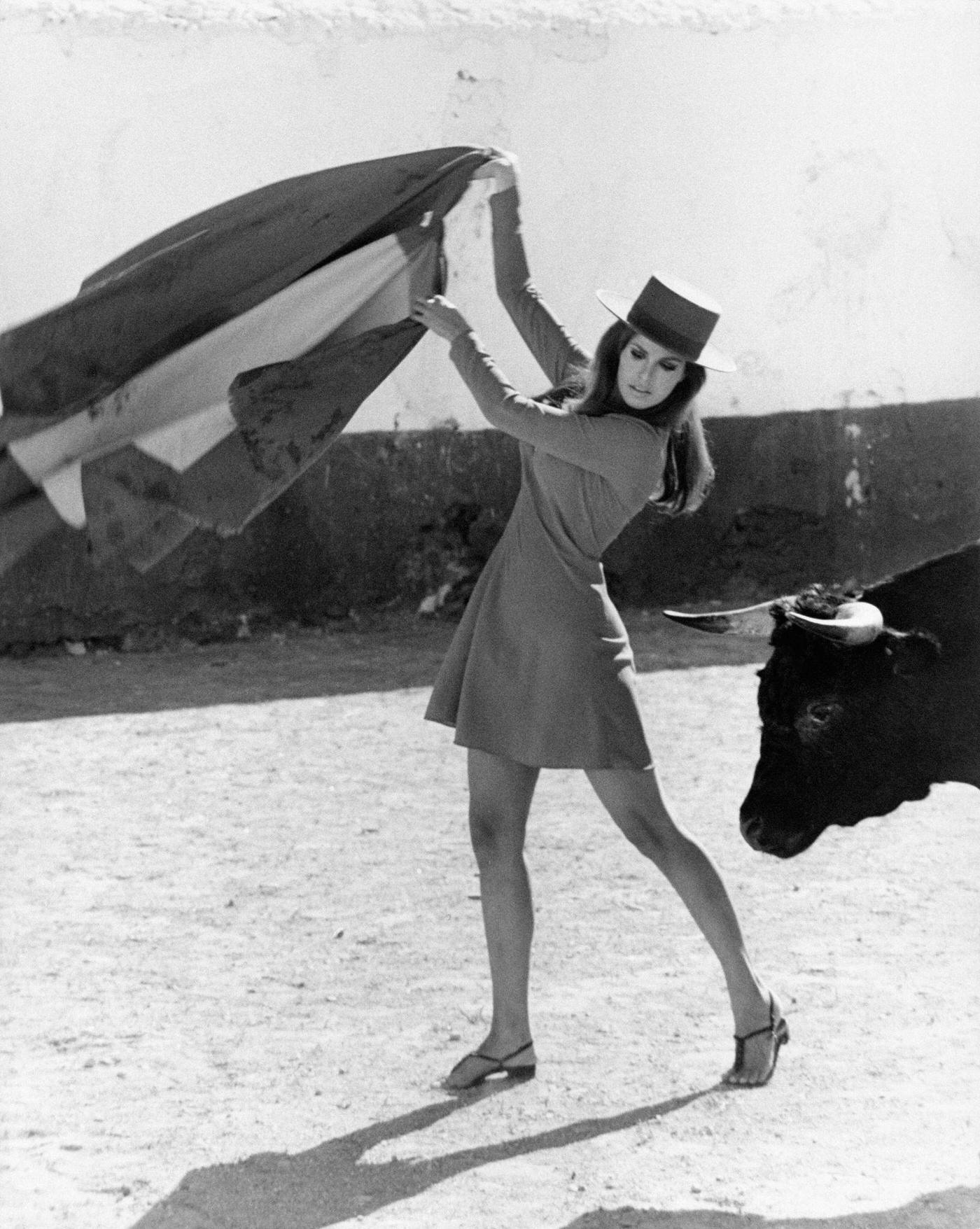 Raquel Welch Holding A Cape And Pretending To Be A Bullfighter. She'S In Spain To Shot The Film Phatom, 1966