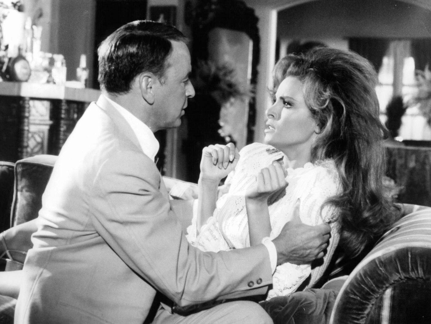 Frank Sinatra Delivering Bad News To Raquel Welch In A Scene From 'Lady In Cement,' 1968.