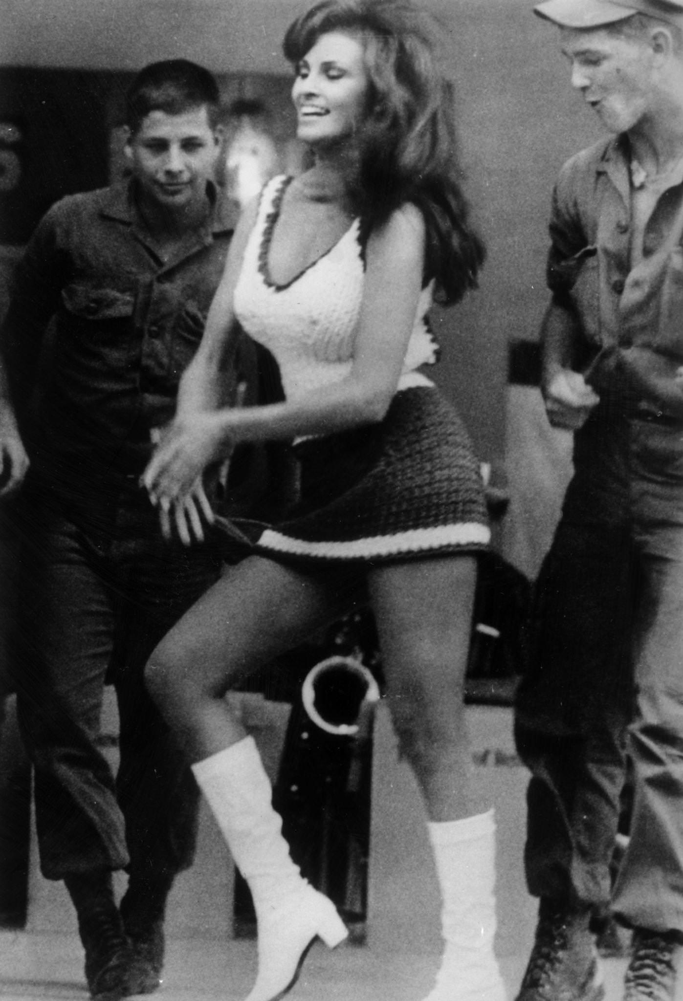 Two Gis Admiring Raquel Welch During Her Visit To Vietnam, January 1968.