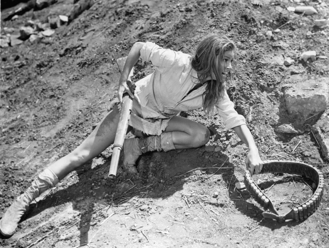Raquel Welch Running For Cover In A Scene From '100 Rifles,' 1969.