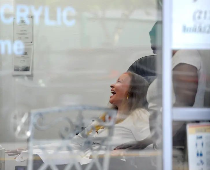 Inside The Salon, Welch Shared A Joyful Moment With Her Unidentified Friend.