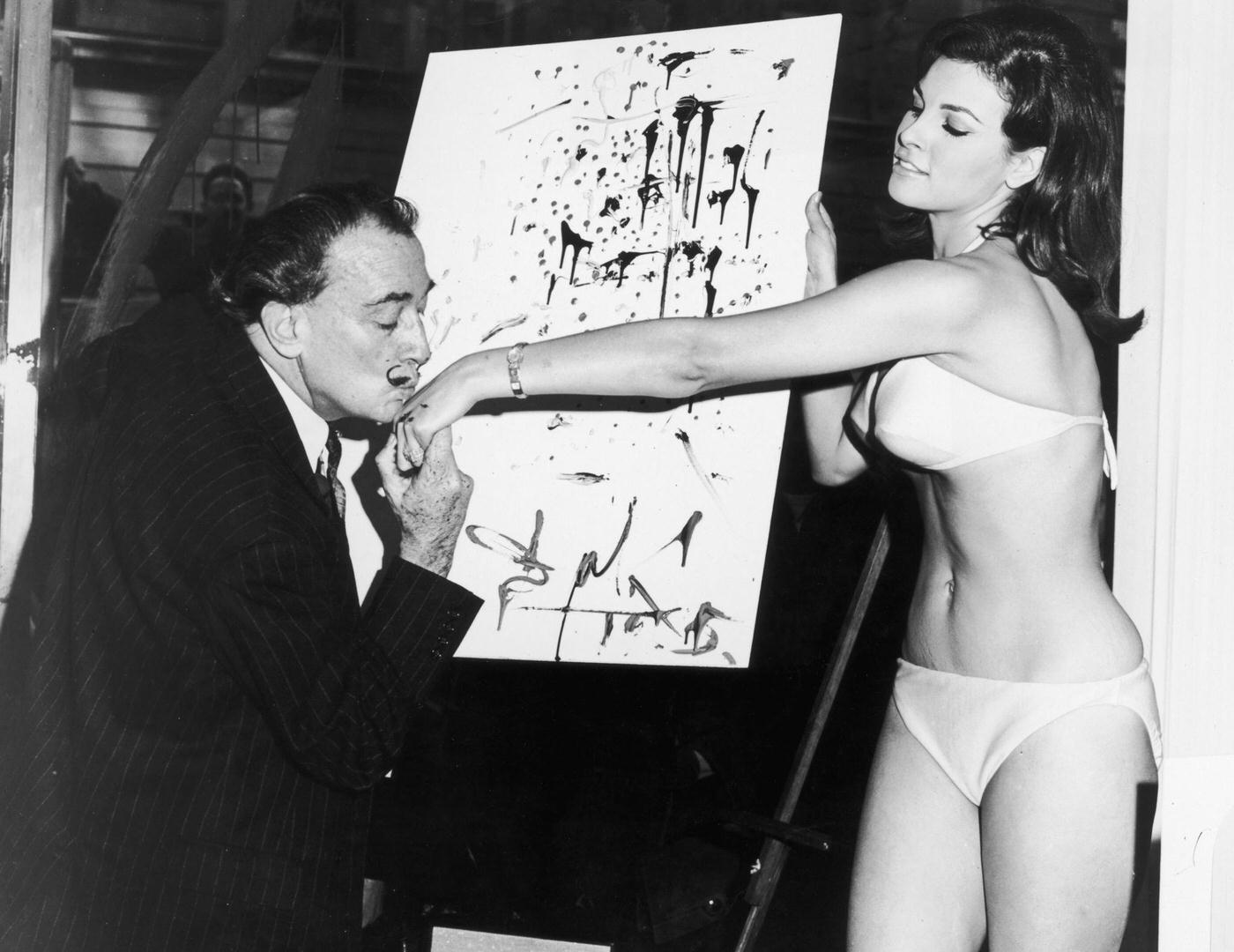 Salvador Dali Kissing Raquel Welch'S Hand, 1965.