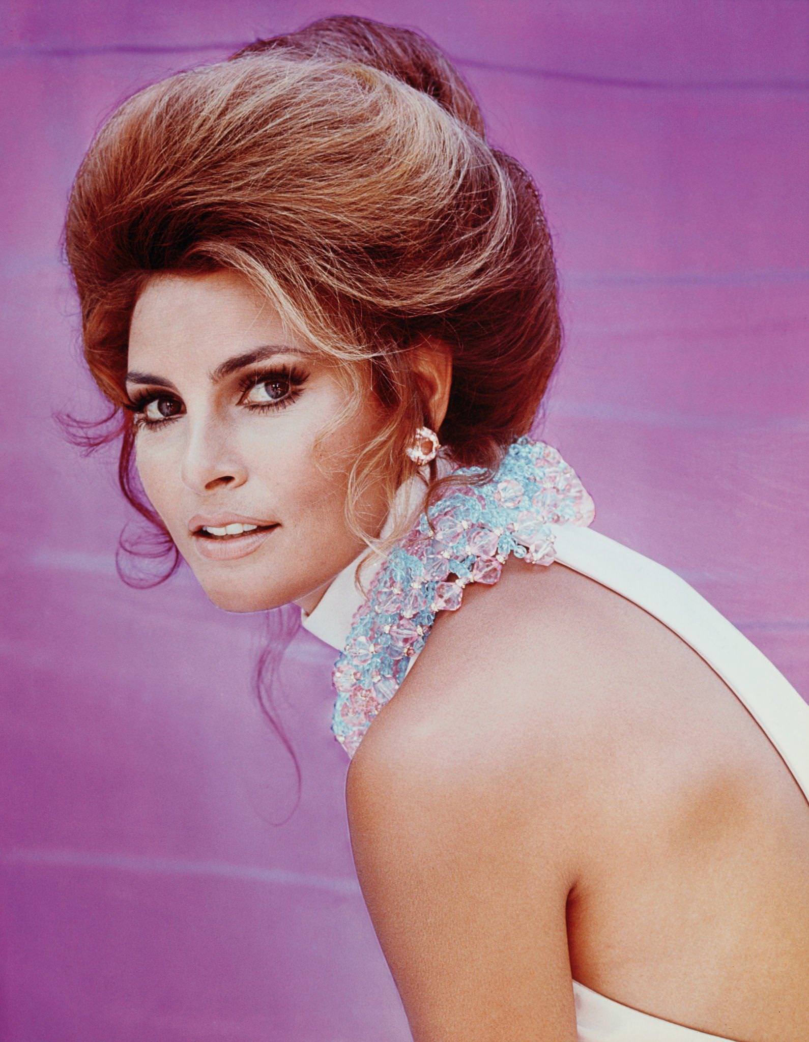 Enigmatic Portrait Capturing The Allure And Mystique Of Raquel Welch.