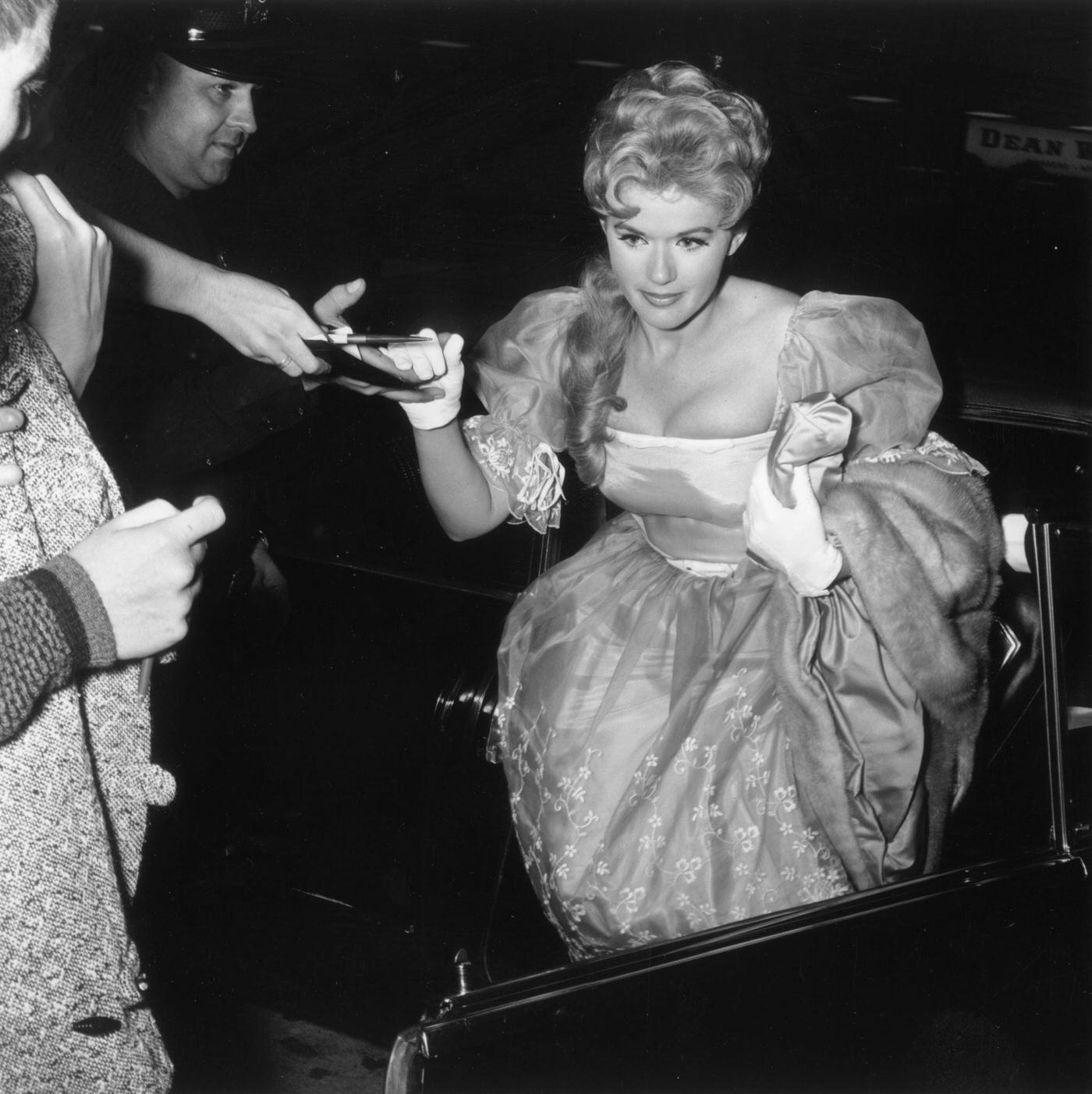 Connie Stevens Steps From A Limousine At The Premiere Of 'Sunrise At Campobello', 1960