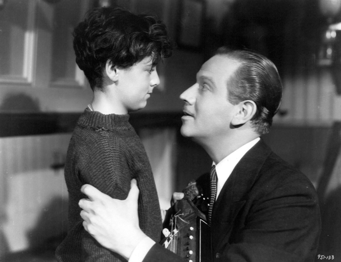 Freddie Bartholomew Held By Melvyn Douglas In A Scene From &Amp;Quot;Captains Courageous&Amp;Quot;, 1937.