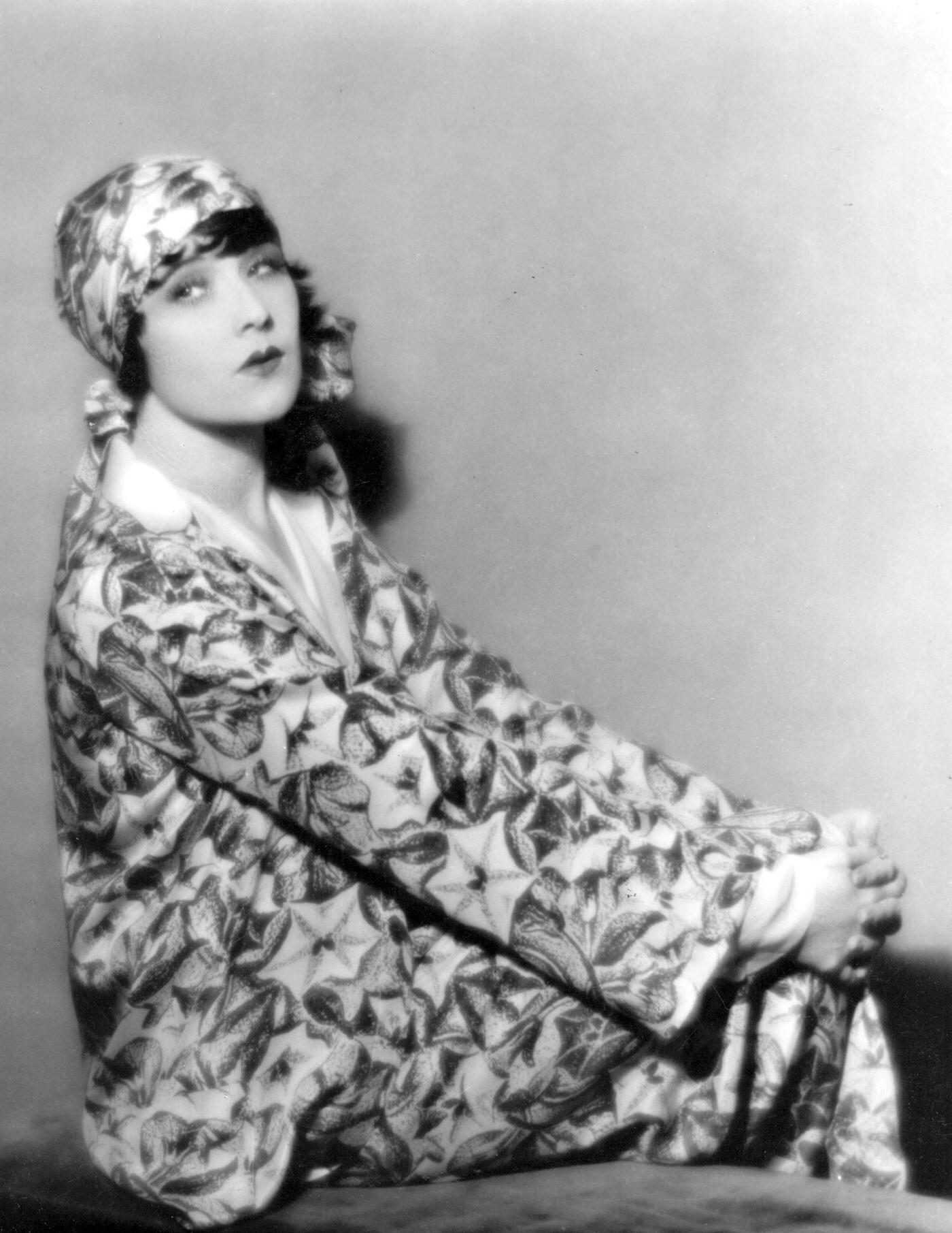 Margaret Livingston (1895 - 1984) The American Silent Screen Leading Lady Is Wearing A Very Floral Outfit With Matching Headscarf. She Appeared With Gloria Swanson In 'What A Widow'.